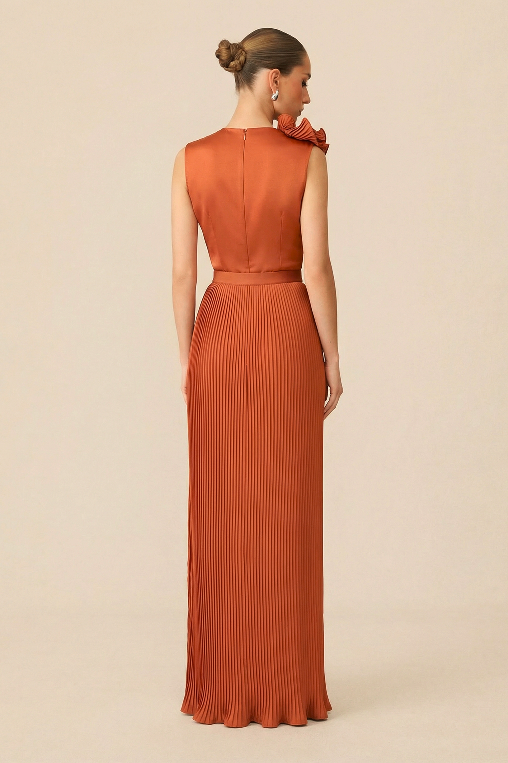 The VIP Vibe Orange V‑Neck Ruffle Top & Pleated Skirt Set