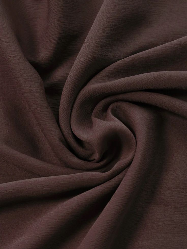 Luxury fabric details on a deep v neck long sleeve maxi dress.
