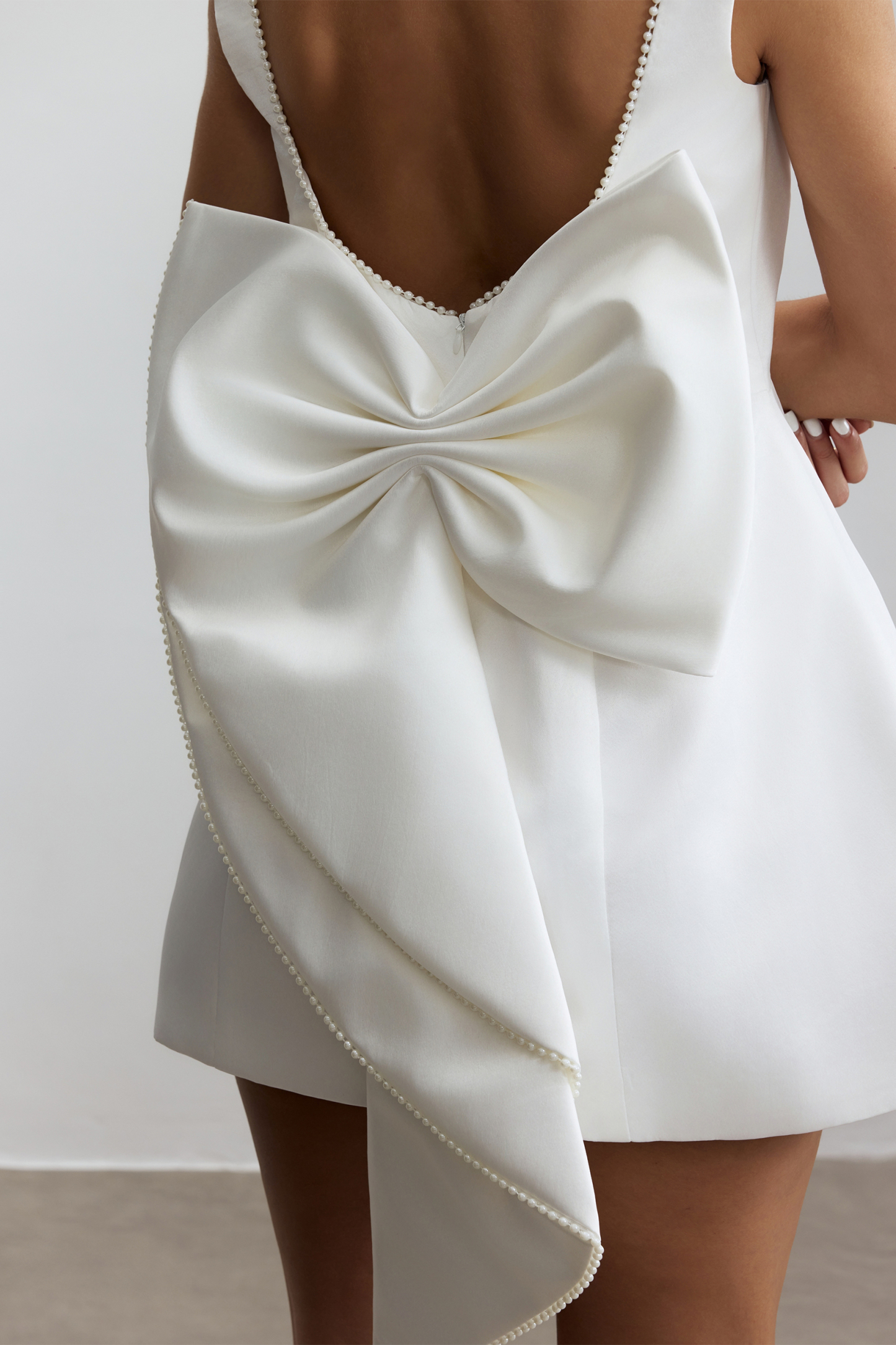 Cecila Bowknot Pearl Backless Mini Dress