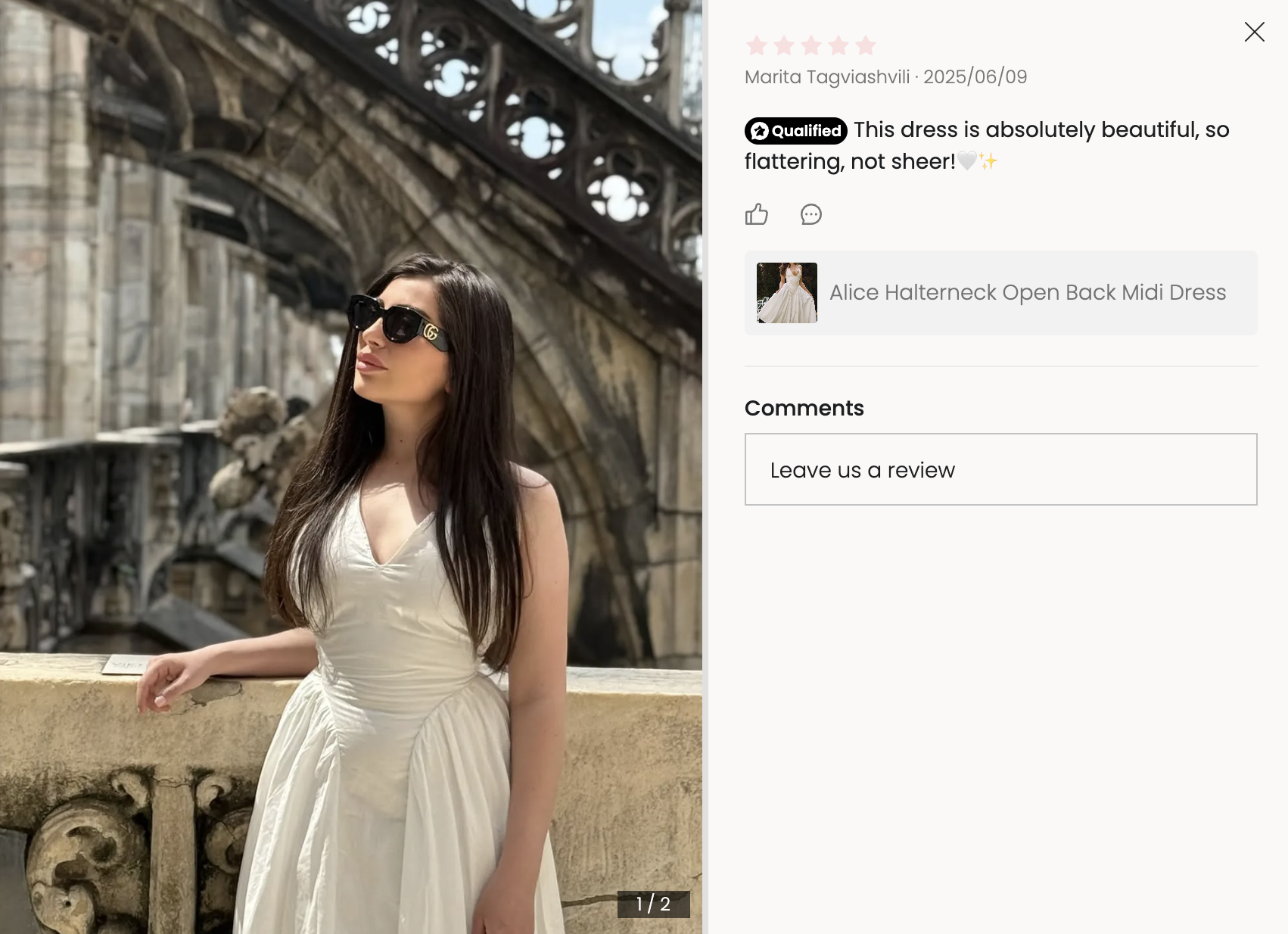 European city backdrop with flowing white midi dress
