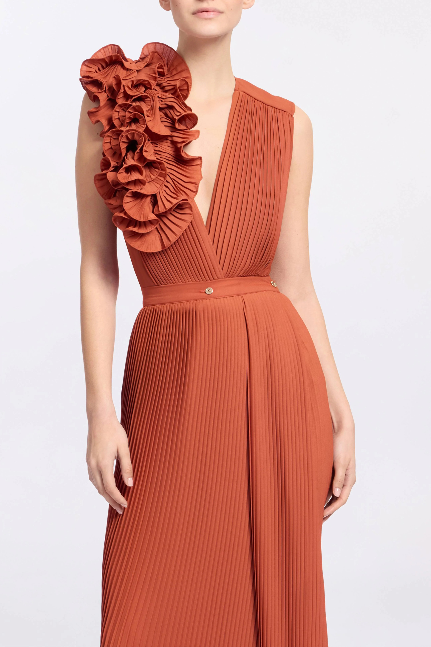 The VIP Vibe Orange V‑Neck Ruffle Top & Pleated Skirt Set