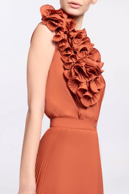 The VIP Vibe Orange V‑Neck Ruffle Top & Pleated Skirt Set