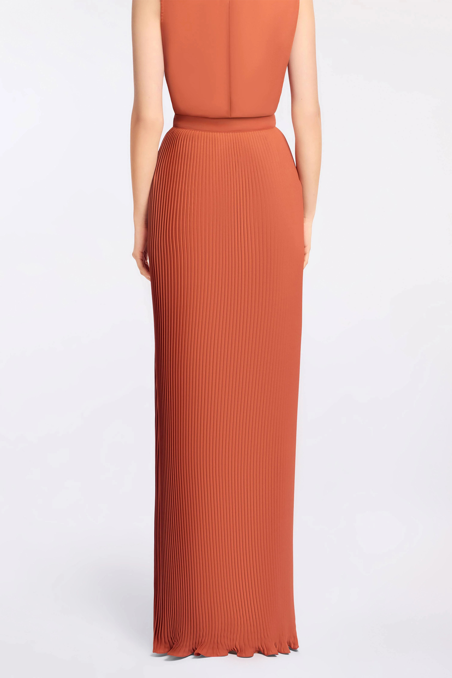 The VIP Vibe Orange V‑Neck Ruffle Top & Pleated Skirt Set