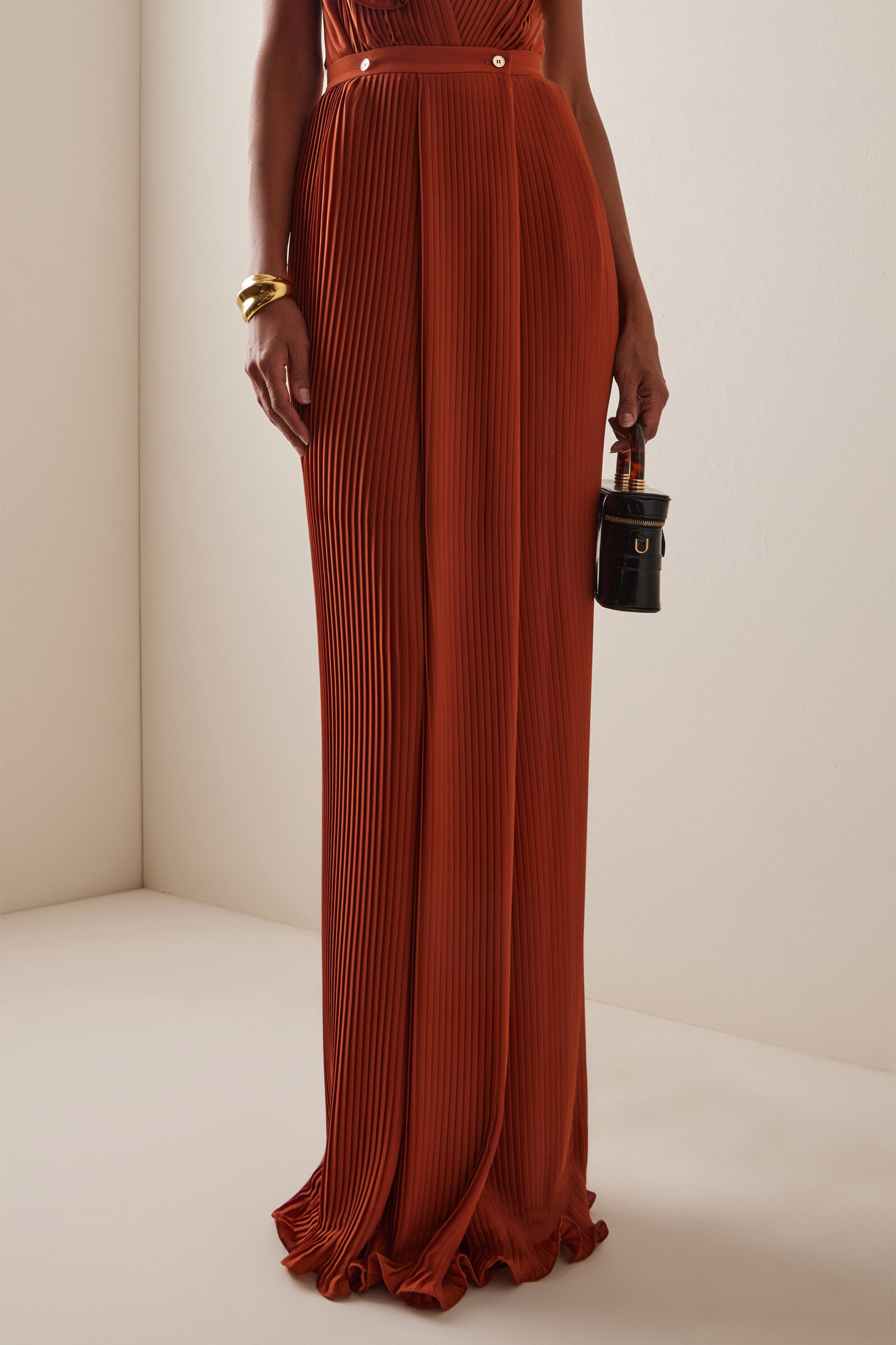 The VIP Vibe Orange V‑Neck Ruffle Top & Pleated Skirt Set