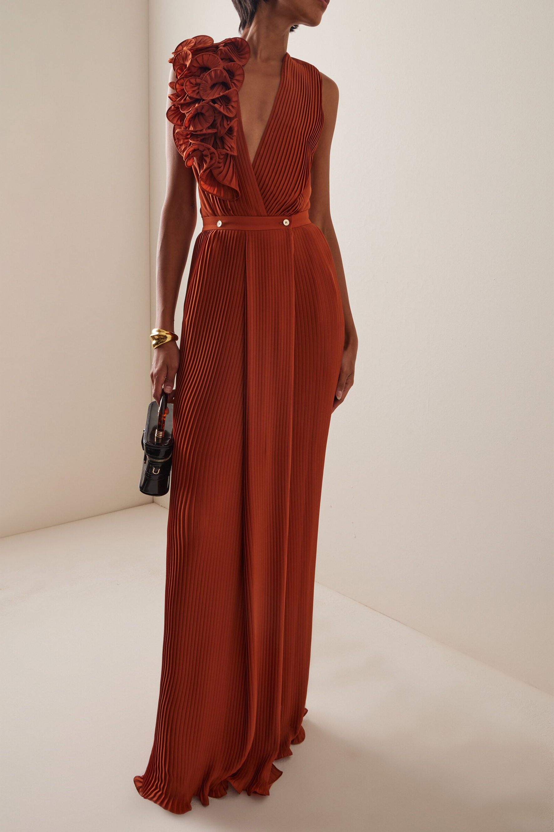 The VIP Vibe Orange V‑Neck Ruffle Top & Pleated Skirt Set