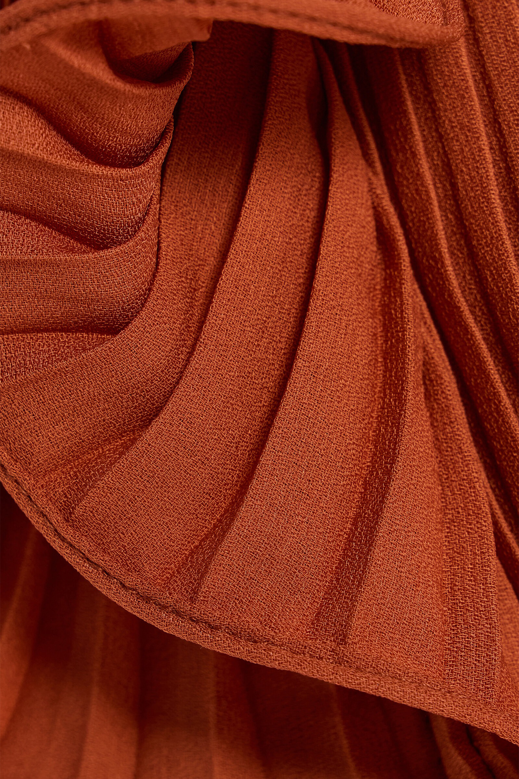 The VIP Vibe Orange V‑Neck Ruffle Top & Pleated Skirt Set