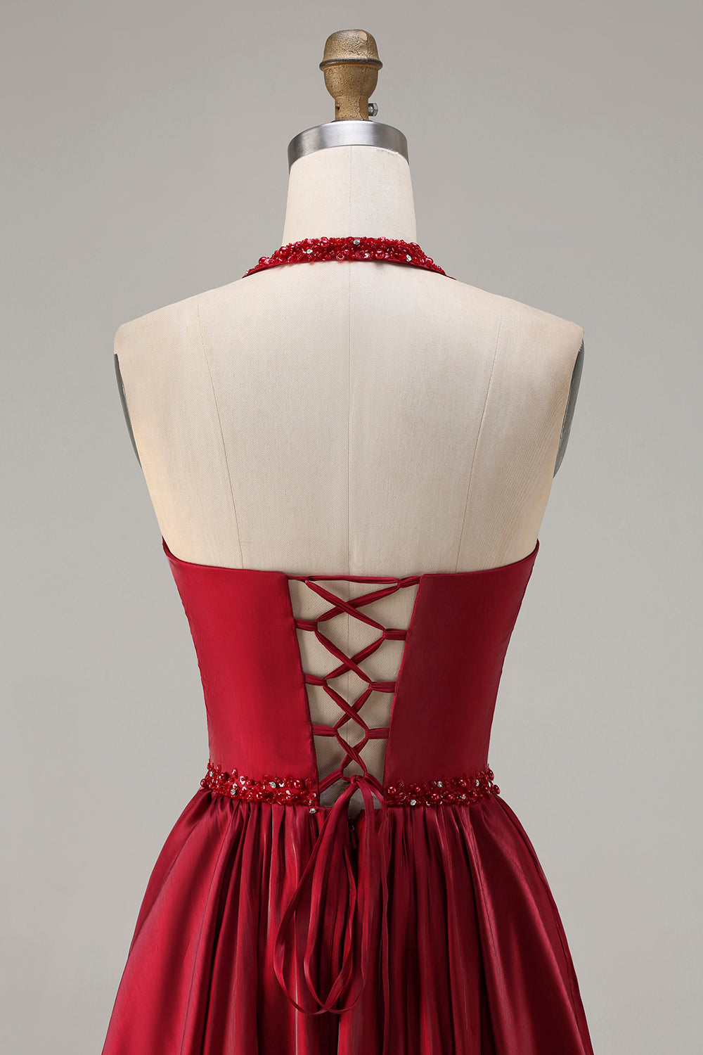 Unique Burgundy Satin A-Line Halter Long Prom Dress with Beading