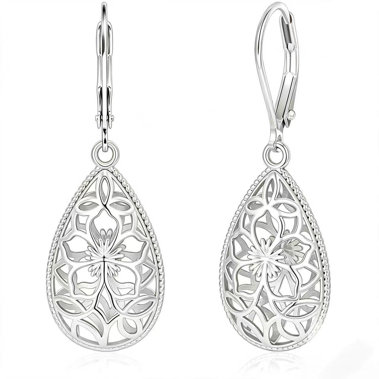 Filigree Teardrop Earrings — A Silver Bloom in Motion