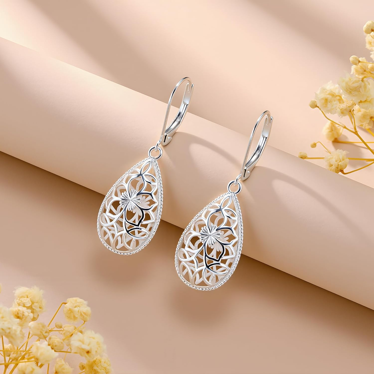 Filigree Teardrop Earrings — A Silver Bloom in Motion
