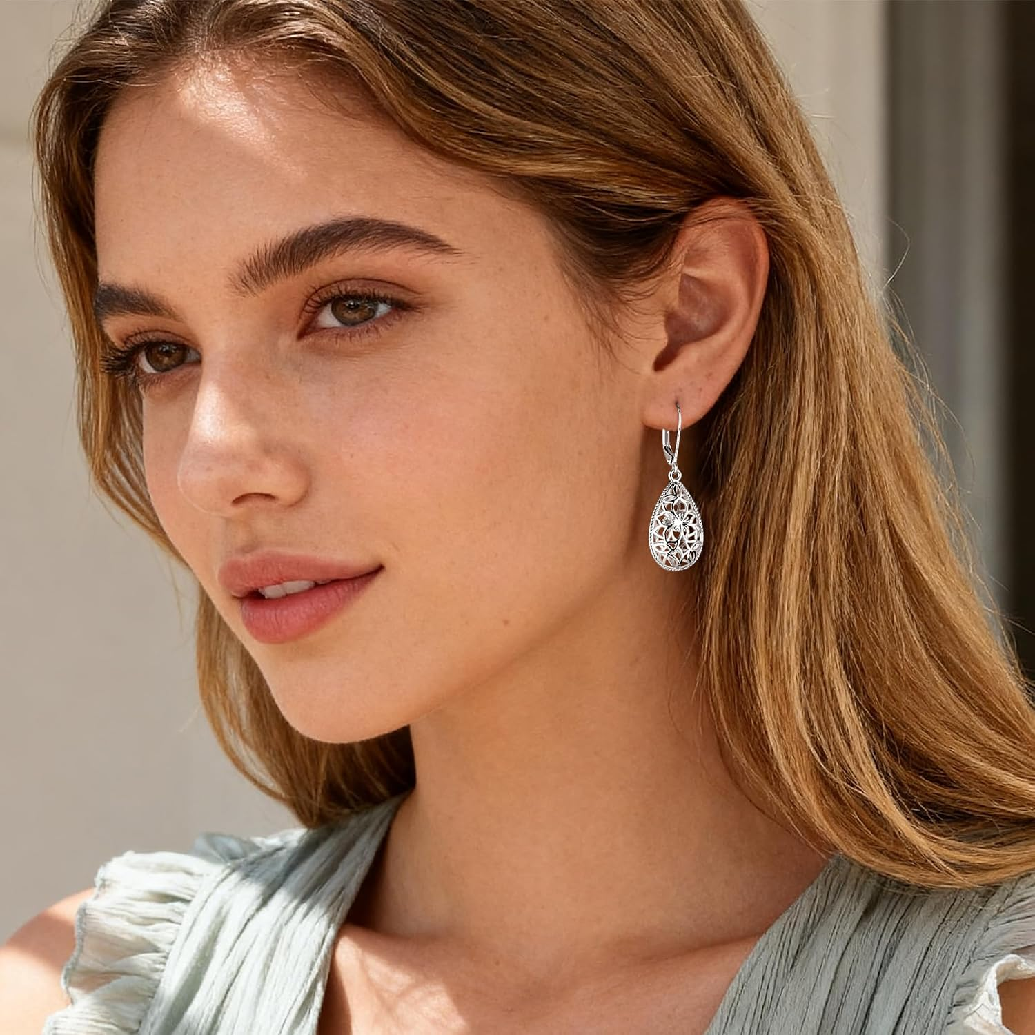 Filigree Teardrop Earrings — A Silver Bloom in Motion