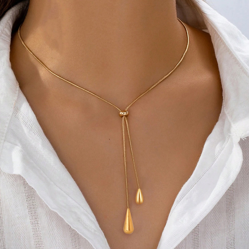 Long Teardrop Necklace — Soft Lines, Golden Elegance