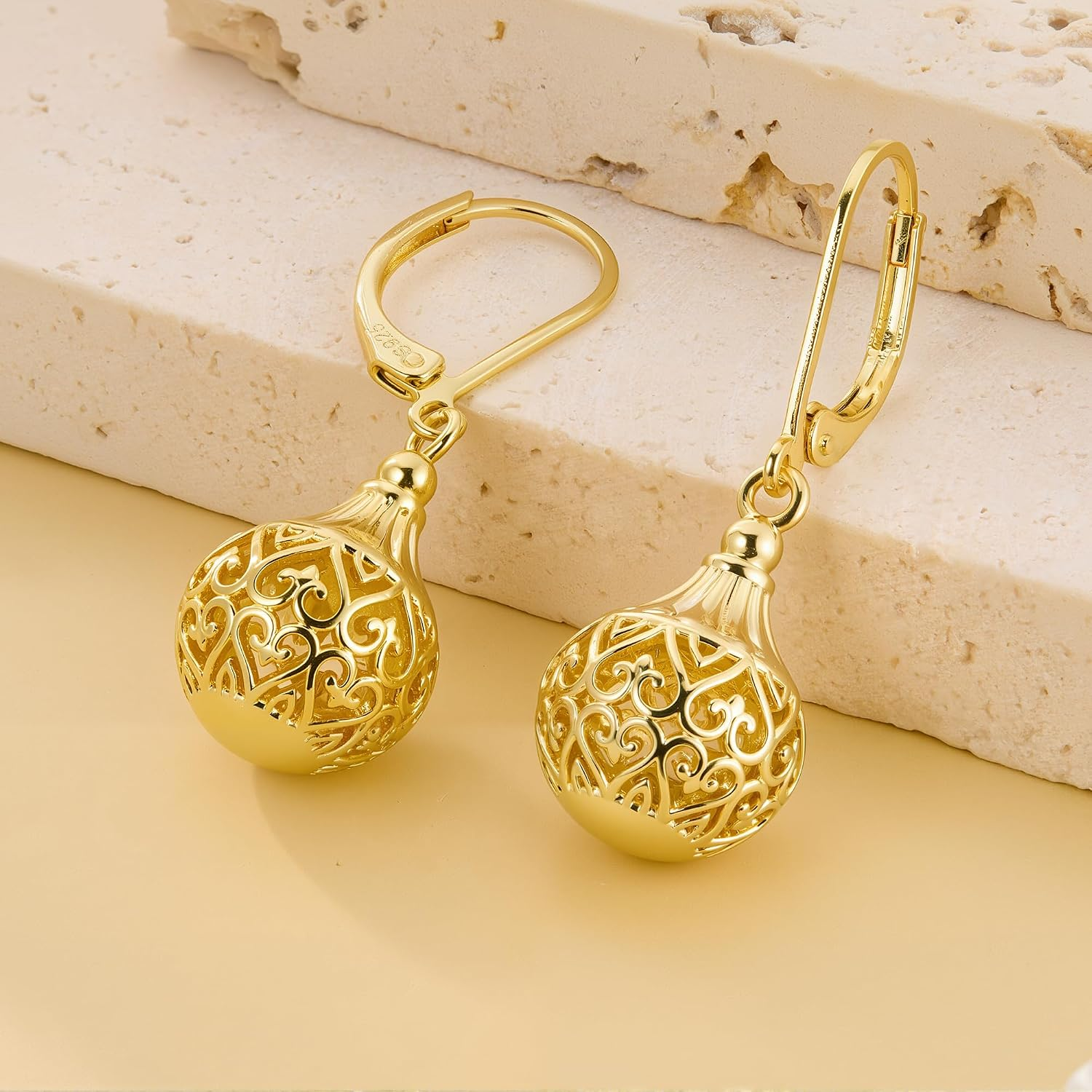 Hollow Ball Drop Earrings — Vintage Gold in Motion