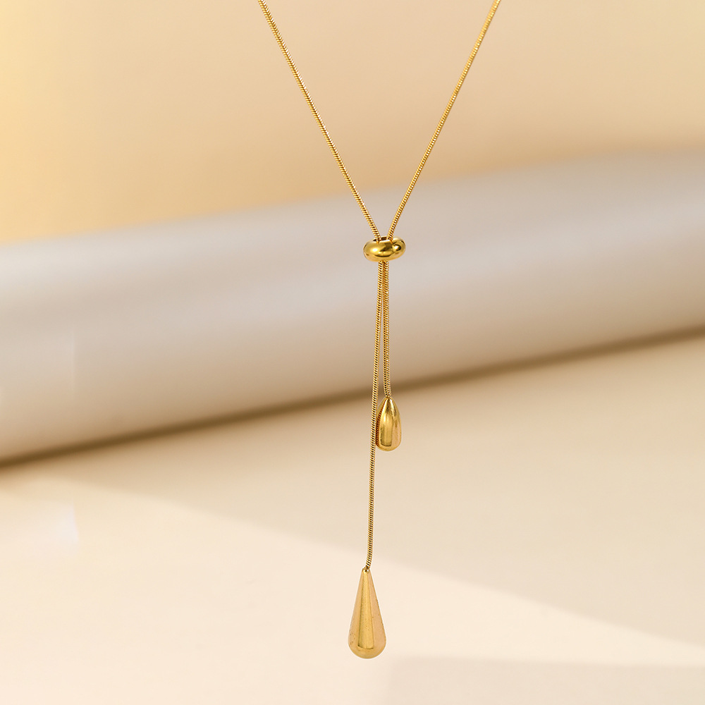 Long Teardrop Necklace — Soft Lines, Golden Elegance