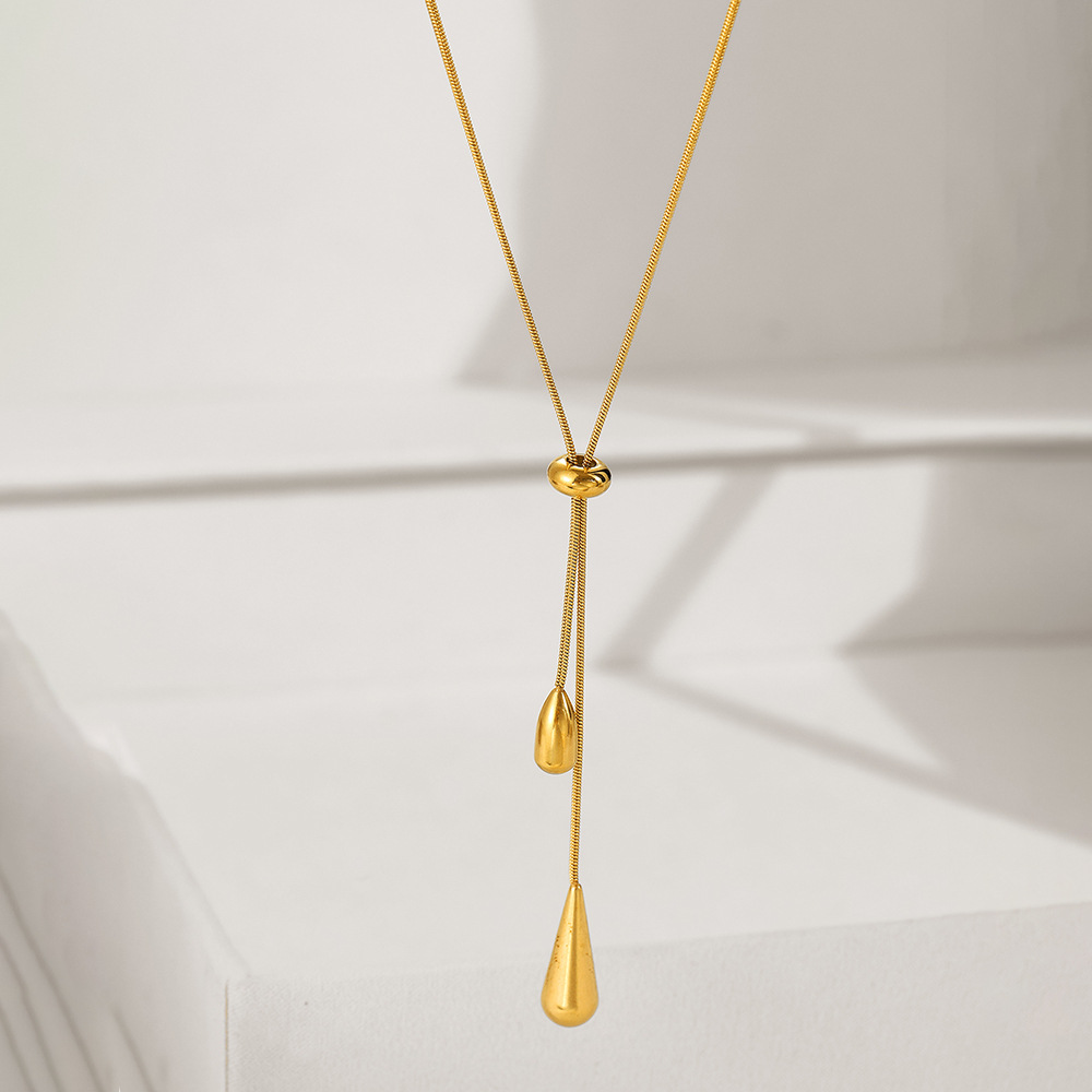 Long Teardrop Necklace — Soft Lines, Golden Elegance