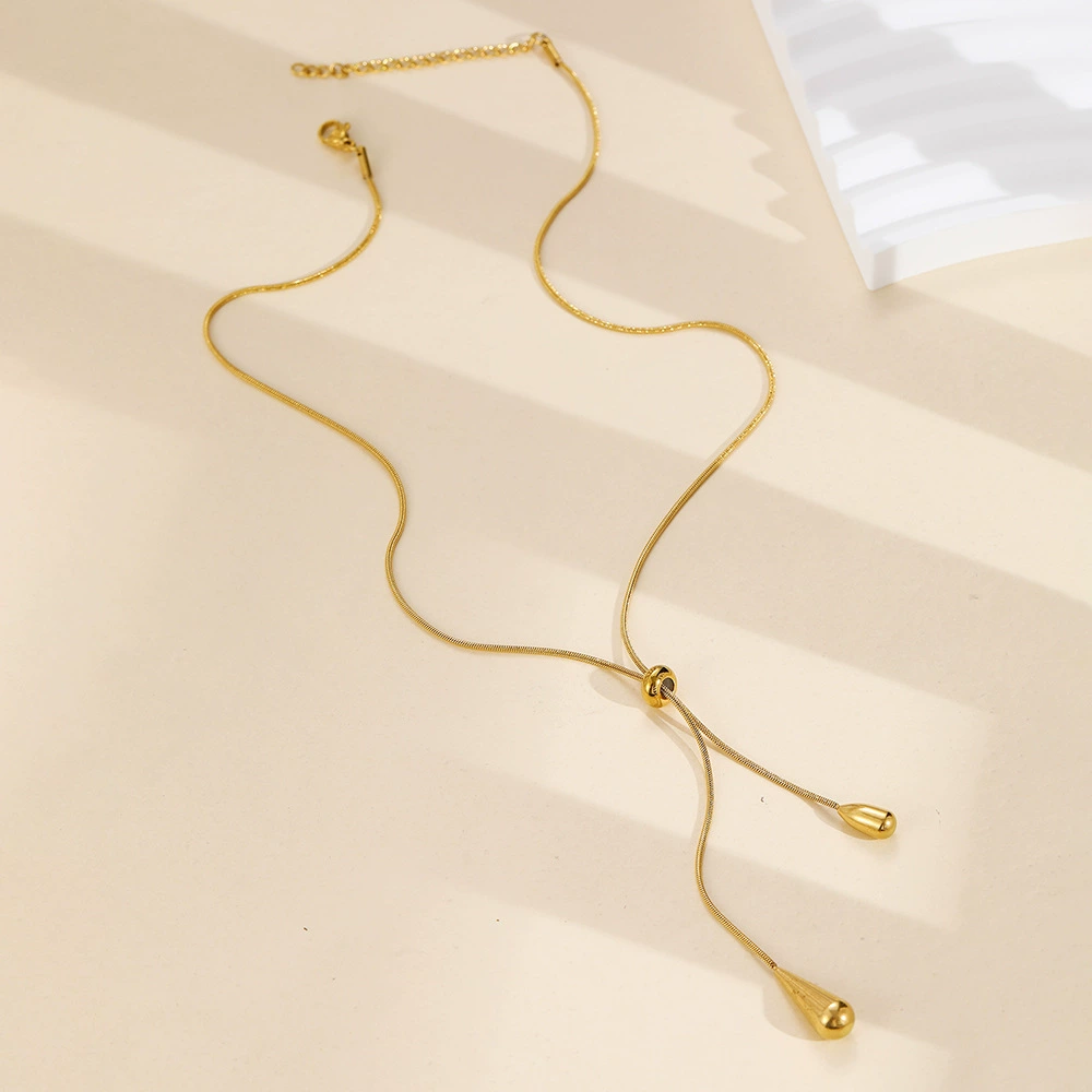 Long Teardrop Necklace — Soft Lines, Golden Elegance