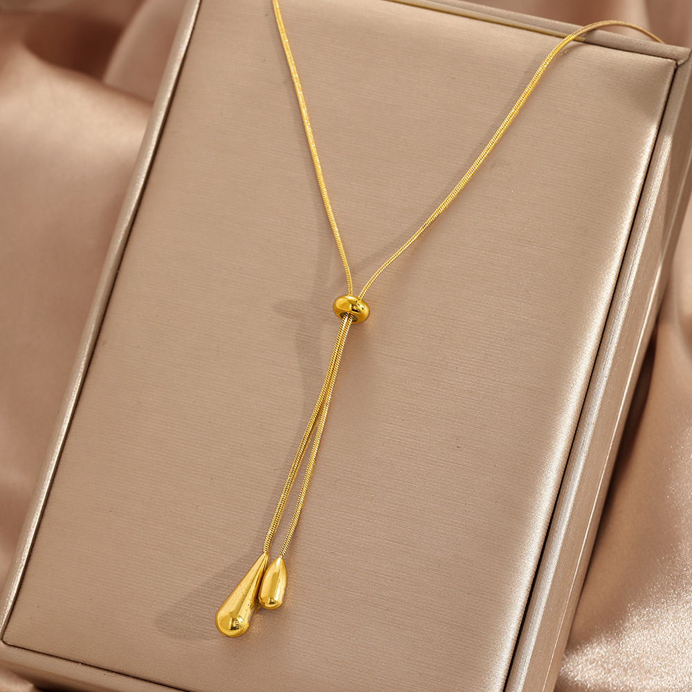 Long Teardrop Necklace — Soft Lines, Golden Elegance