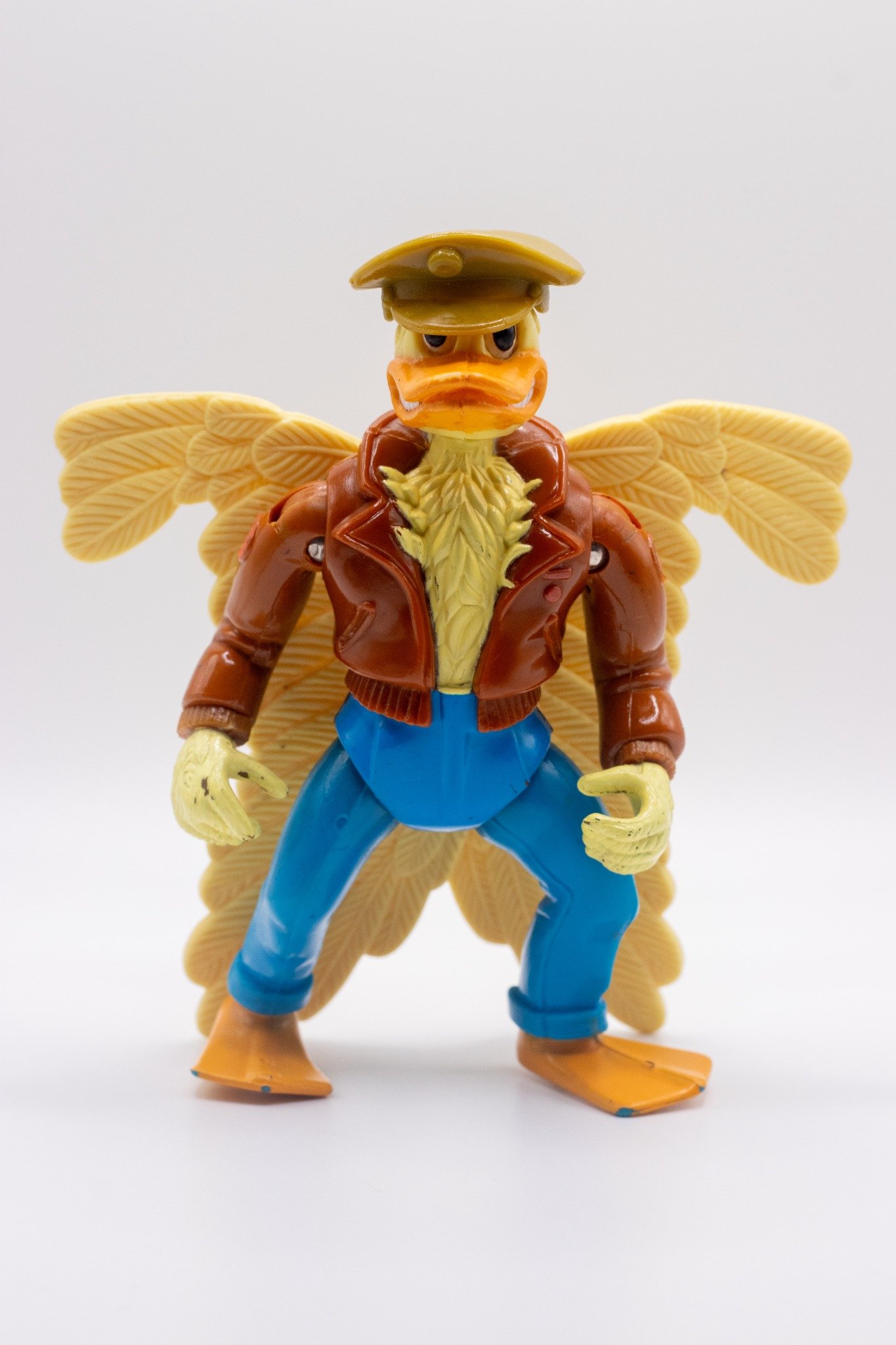 Front-facing shot of TMNT Ace Duck action figure with folded wings and hat