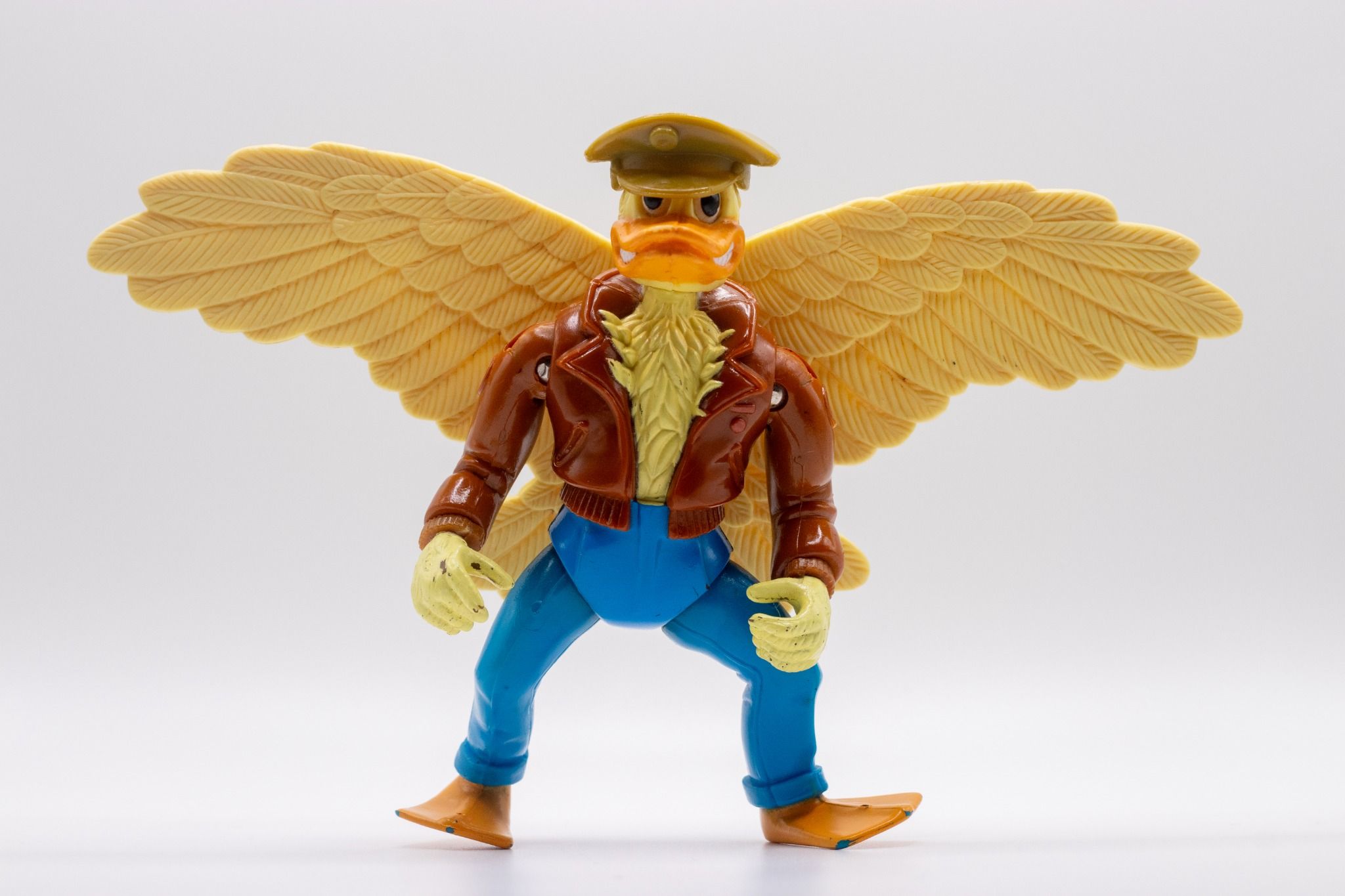 Front-facing shot of Ace Duck action figure with extended wings and hat