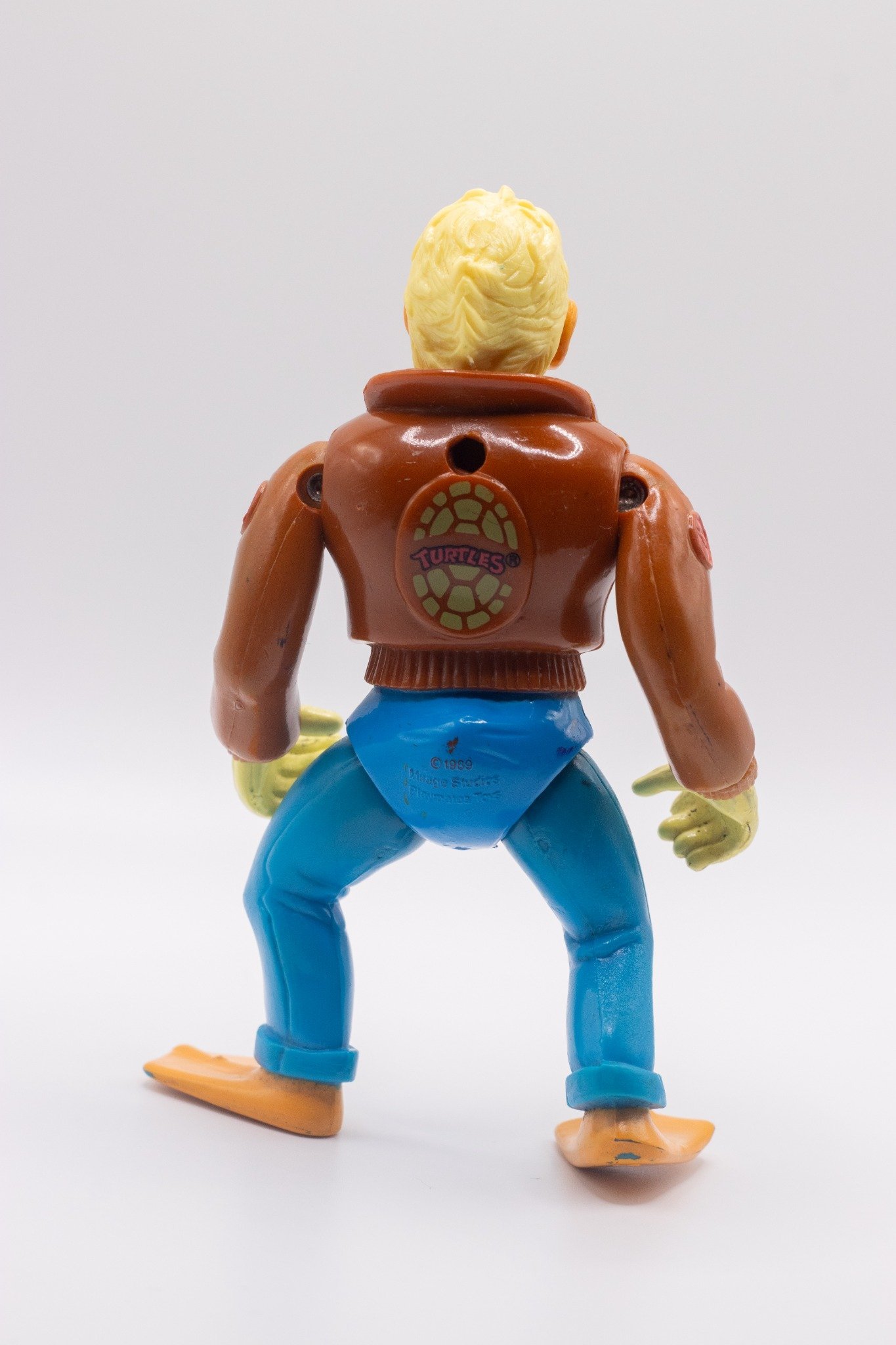 Rear shot of Ace Duck action figure without hat and wings