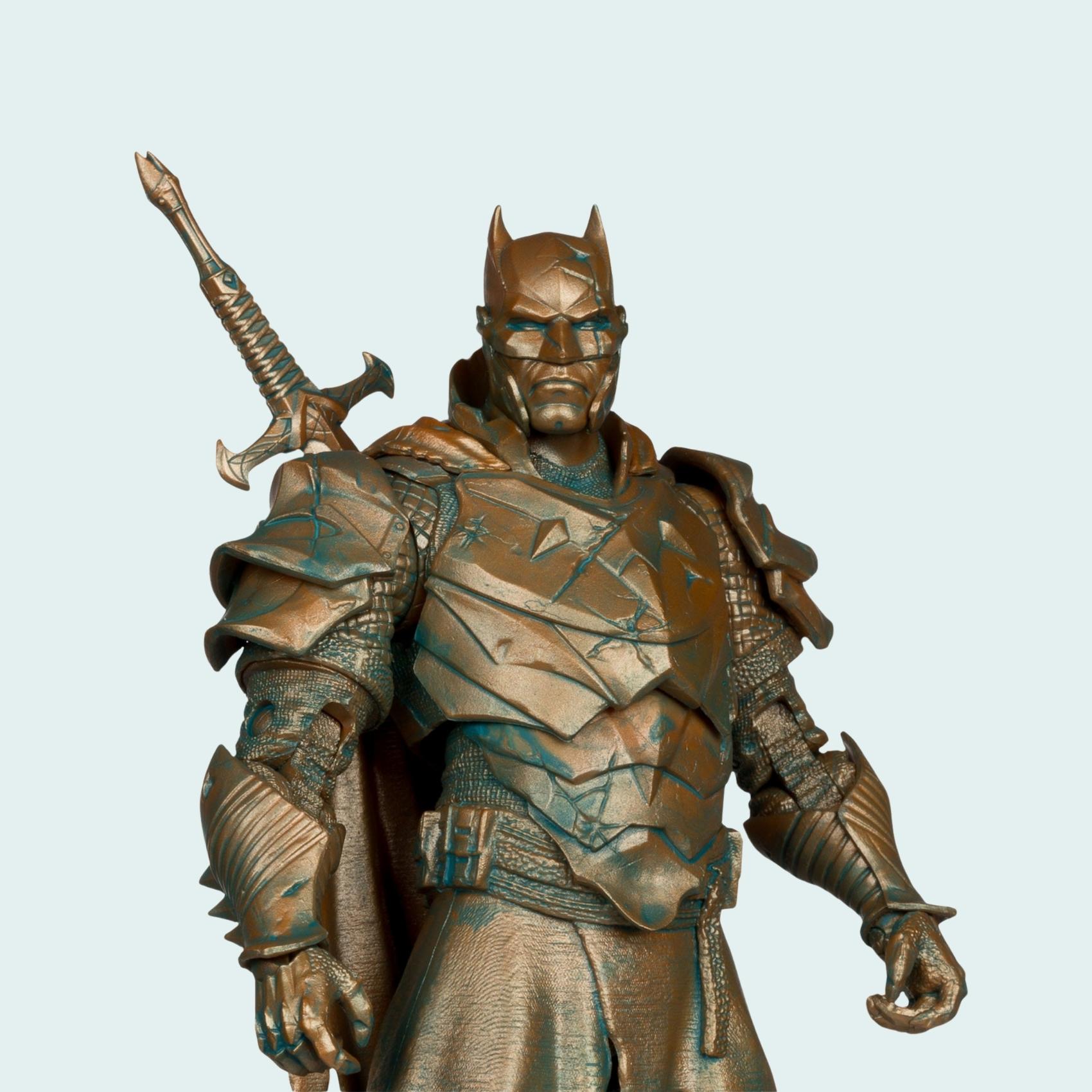 Front close-up shot of Batman Dark Knights of Steel Patina Edition action figure with weathered bronze armour and helmet
