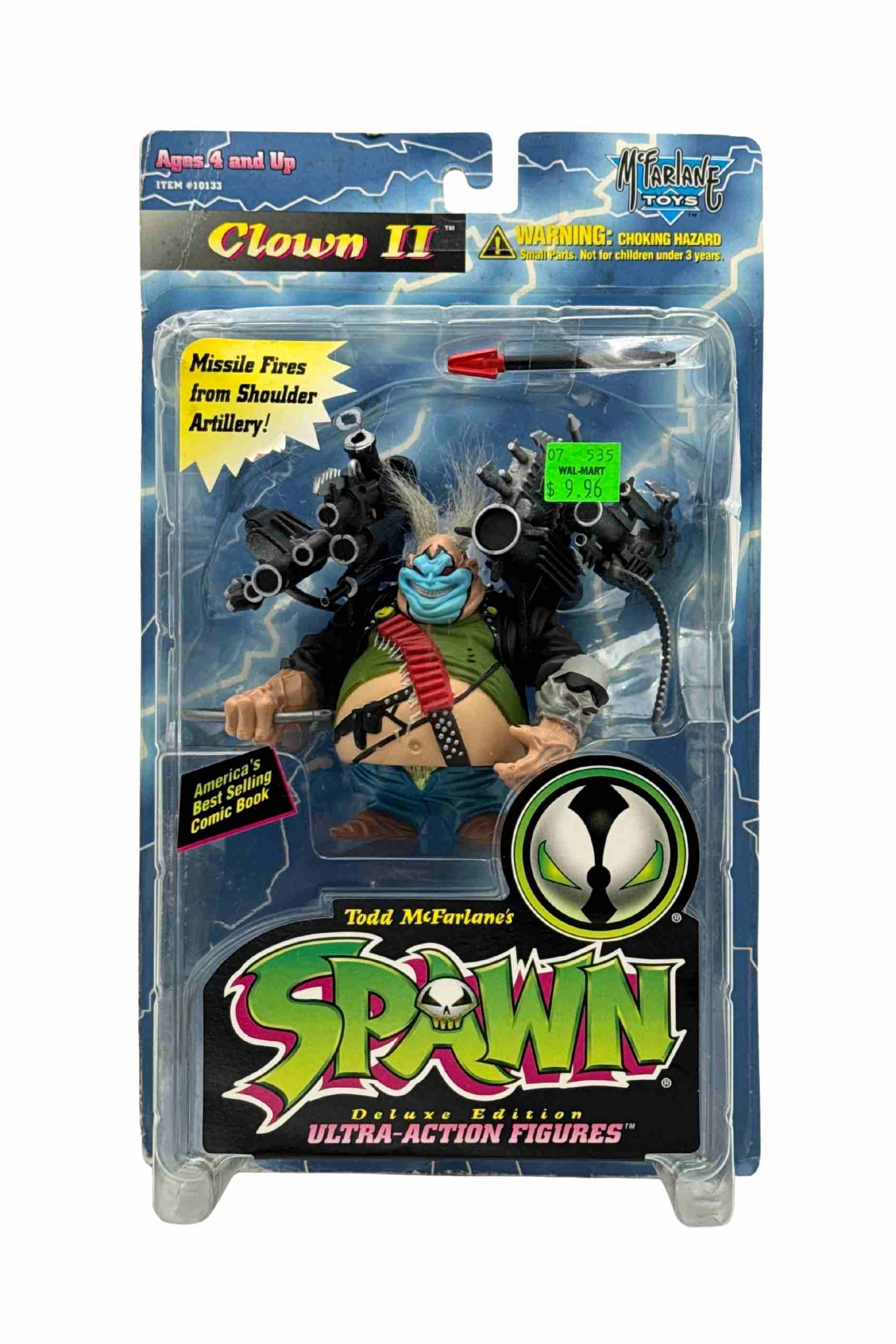 Front view of Clown II Spawn Series 4 action figure sealed on blister card with black shoulder artillery and missile accessory