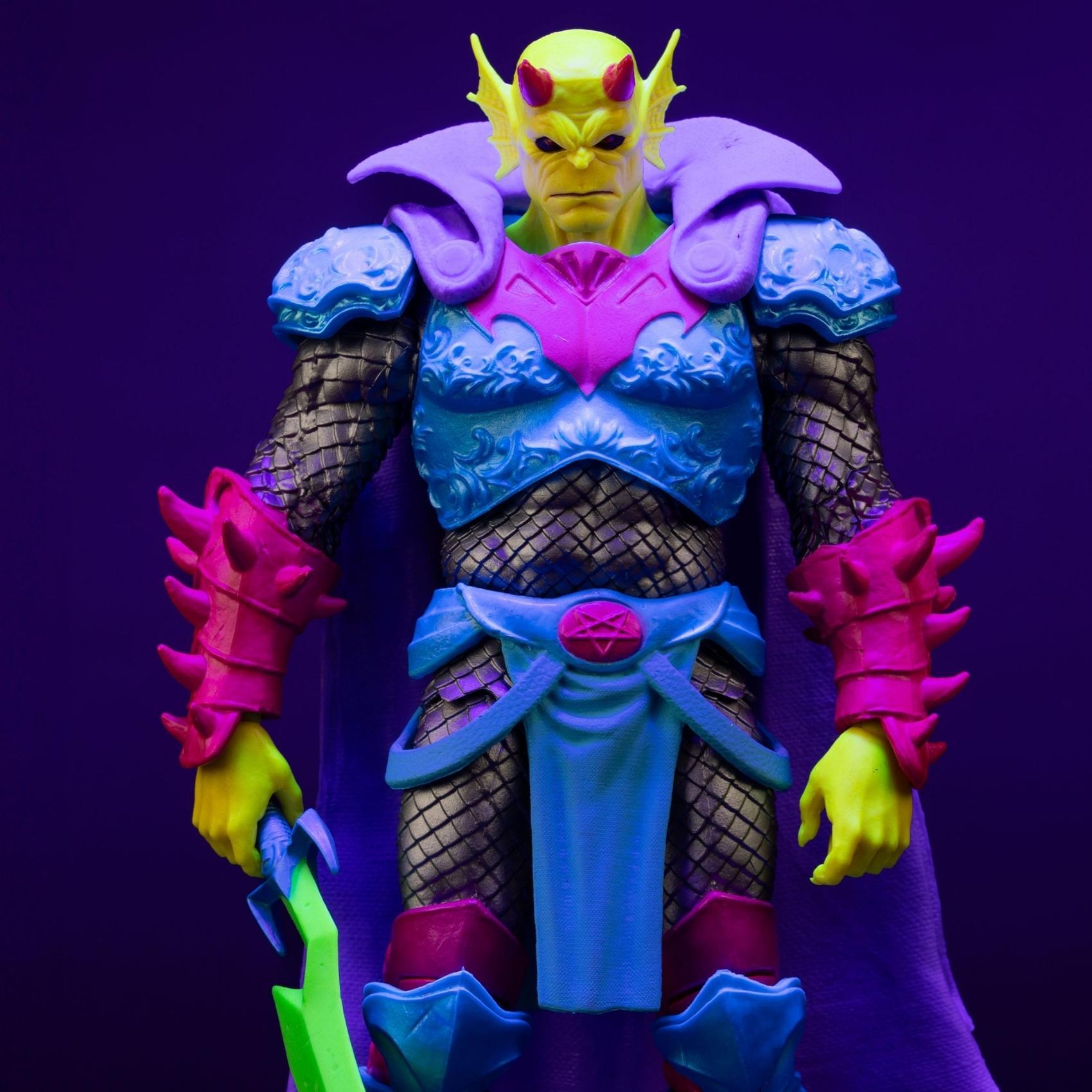 Front facing shot of Demon Knights Black Light Edition The Demon action figure with neon green sword and purple cape under black light