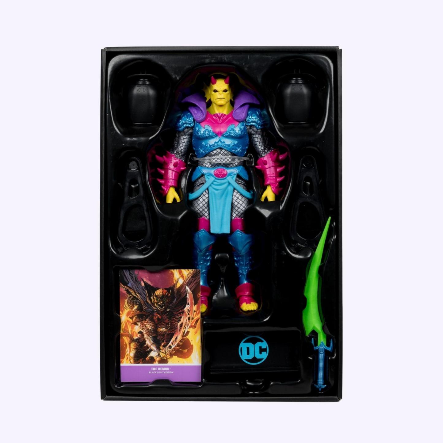In box shot of Demon Knights Black Light Edition The Demon action figure with sword accessory, black lights, base and DC art card