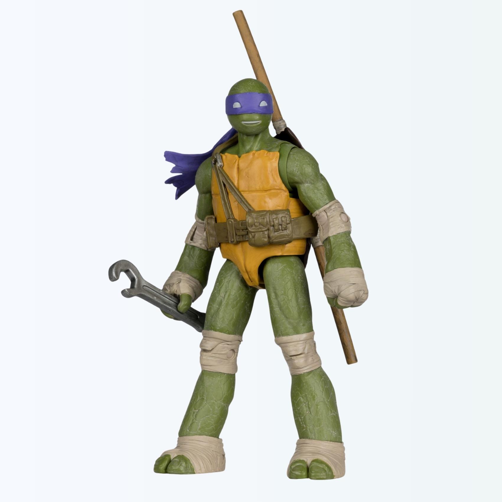 Full-body front shot of Donatello action figure holding wrench accessory at his side