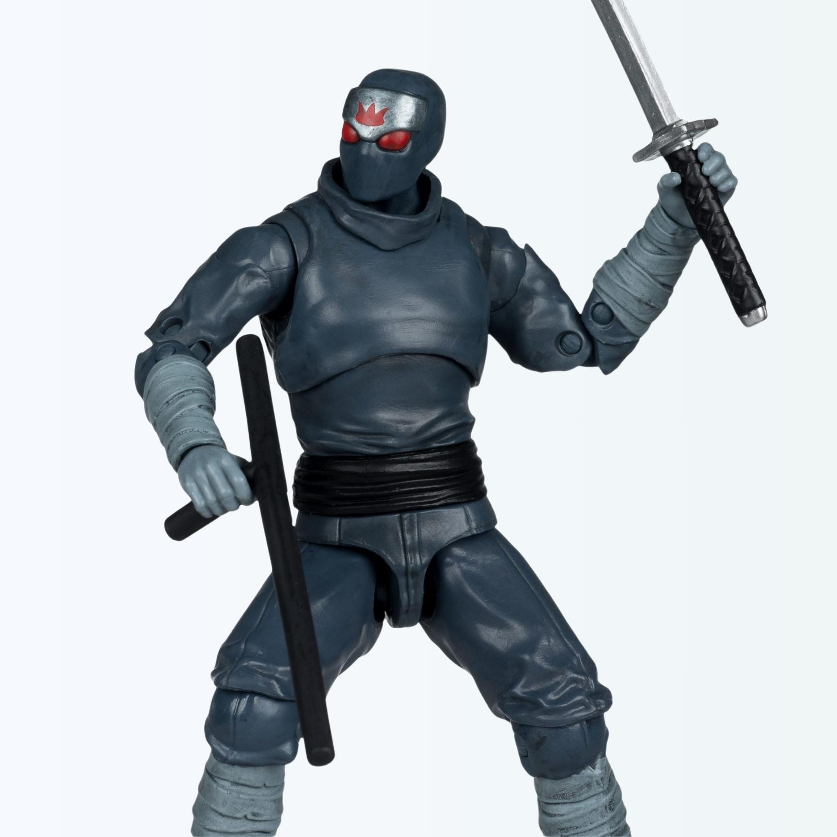 Dynamic pose of TMNT Foot Soldier action figure wielding katana and tonfa