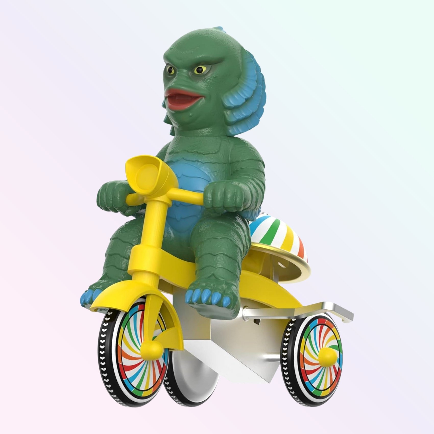 Right-angled shot of Creature from the Black Lagoon figure with yellow handlebars and rainbow wheels