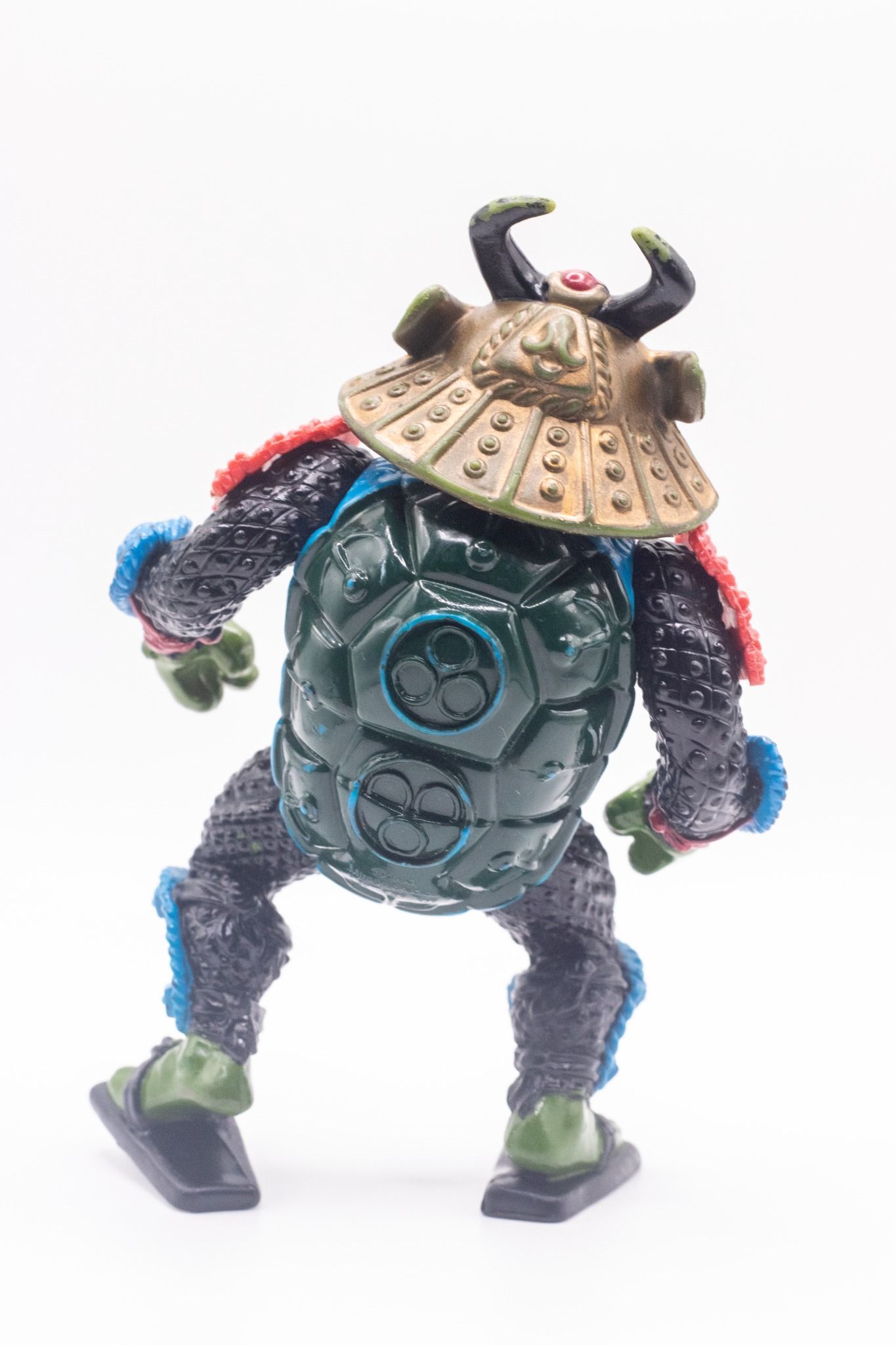 Rear view of Samurai Leo action figure showing shell and helmet detail