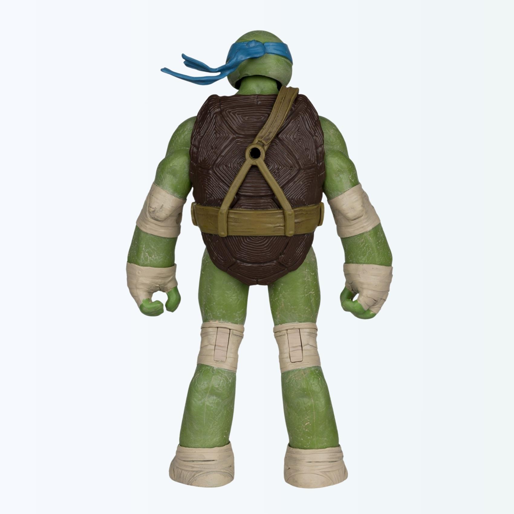 Rear shot of Leonardo action figure showing textured turtle shell and back strap