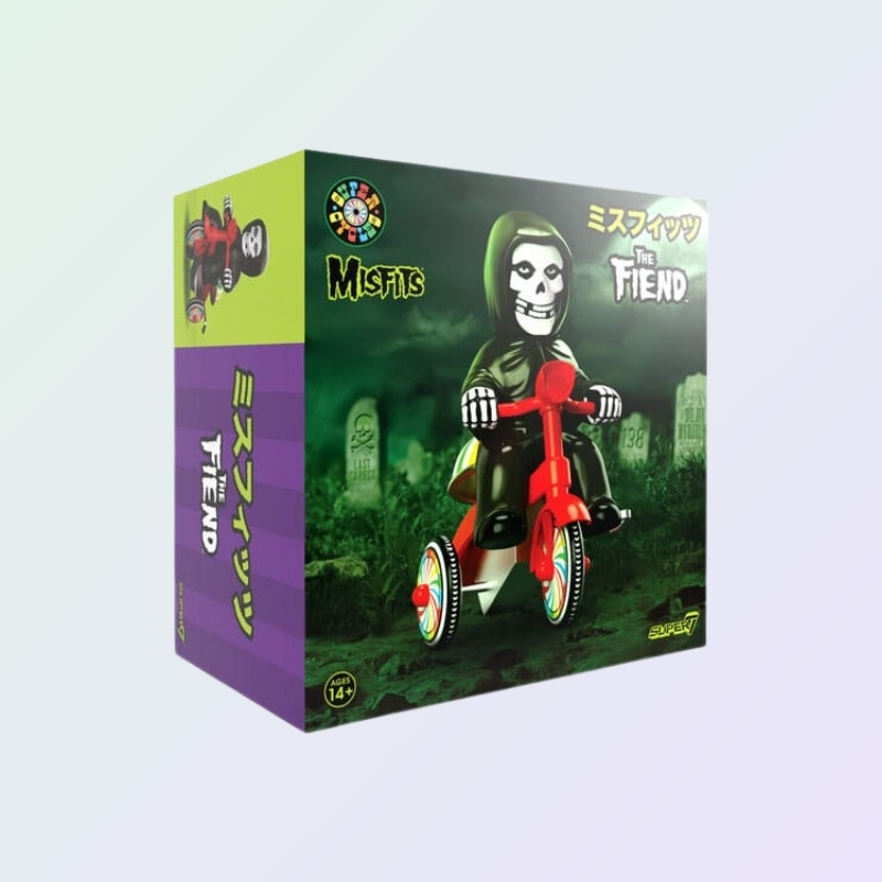 Close-up of Misfits The Fiend figure packaging featuring spooky graveyard background and stylised Japanese branding