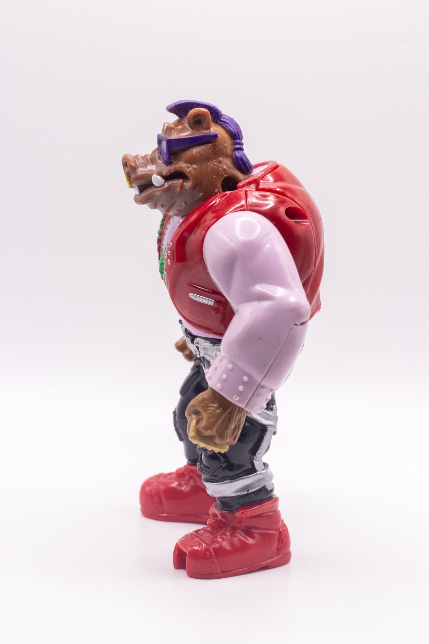 Left side profile of Mutatin' Bebop action figure in mutated form
