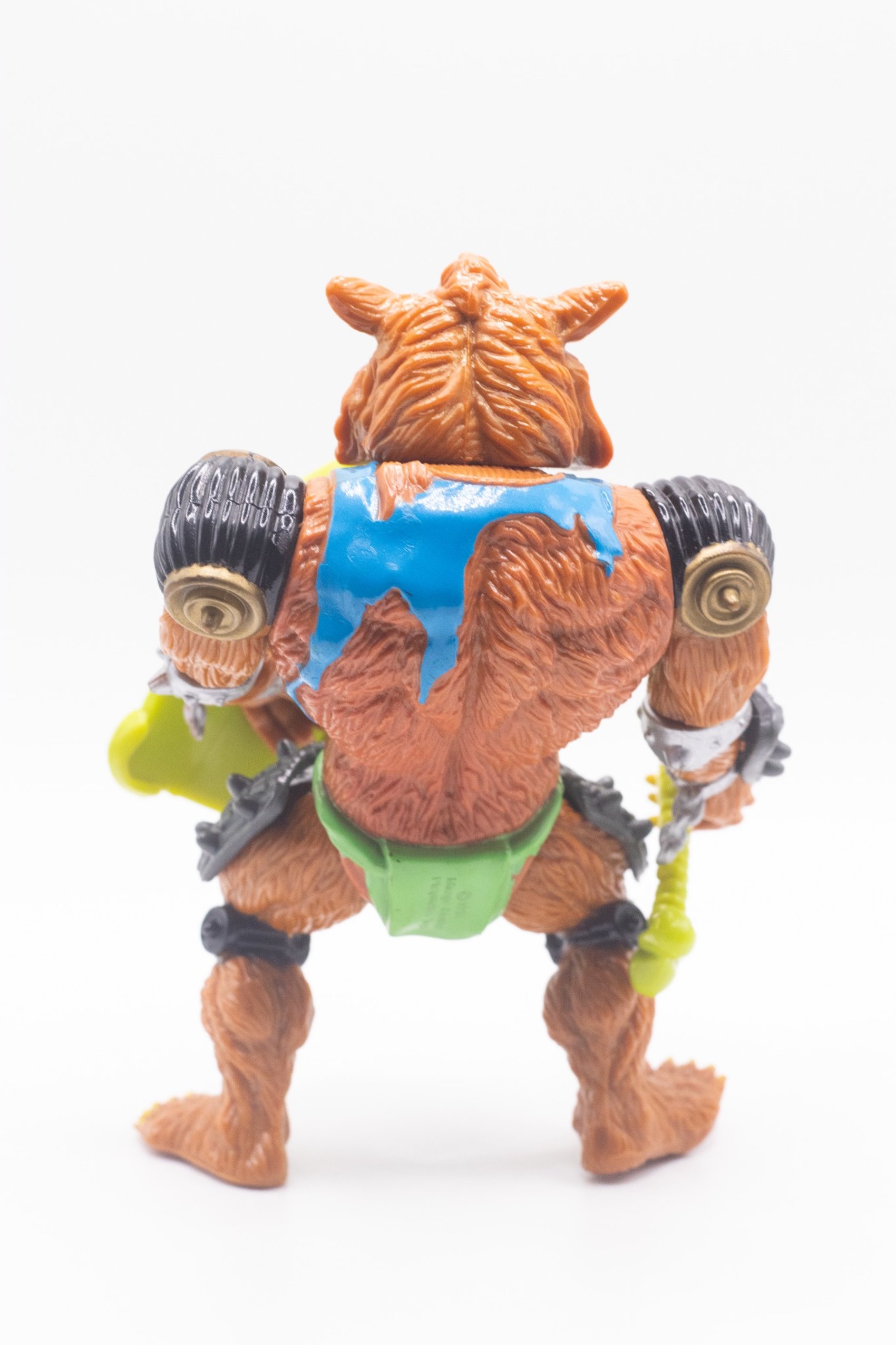 Rear shot of Rahzar action figure showing blue shoulder detail and textured fur sculpt