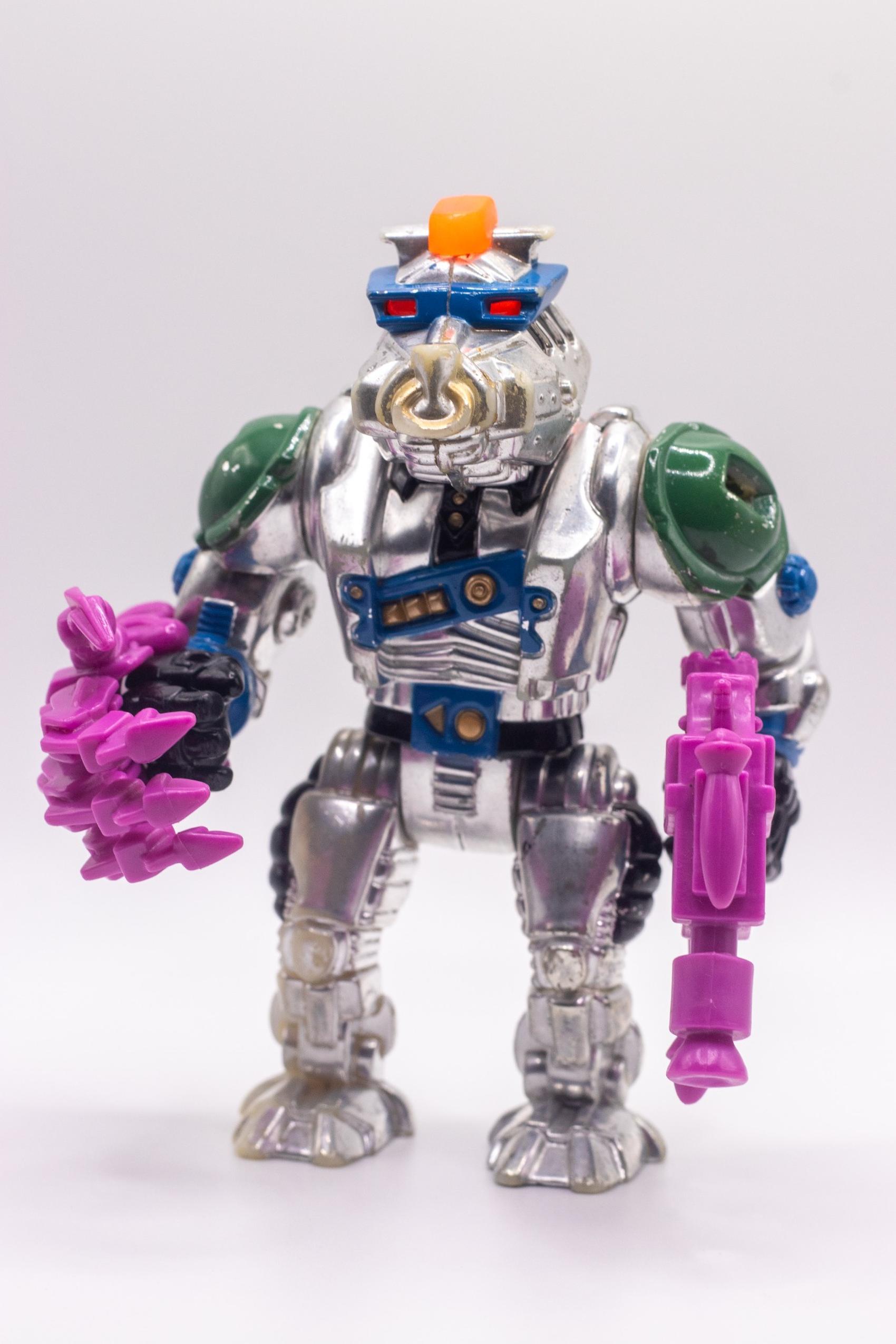 Front-facing shot of Robotic Bebop action figure with Mechanical Mutant Claw and Lazer Luger–Flamethrower combo