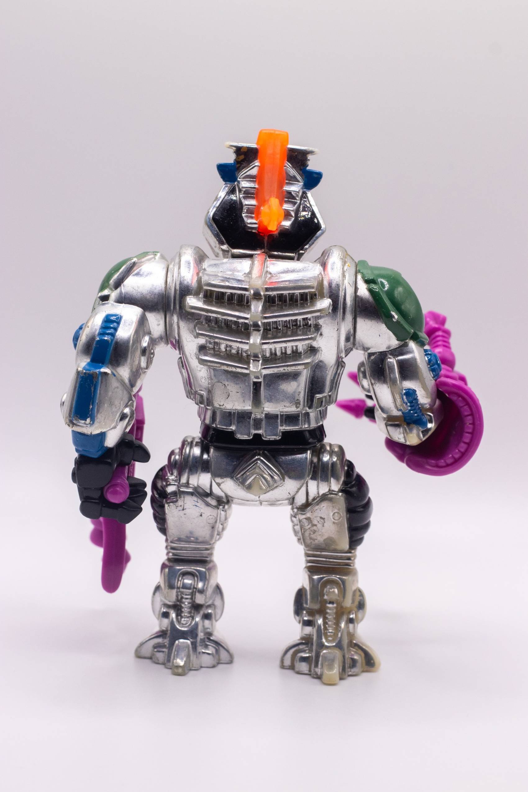Rear view of Robotic Bebop action figure with mohawk and mechanical detail on back