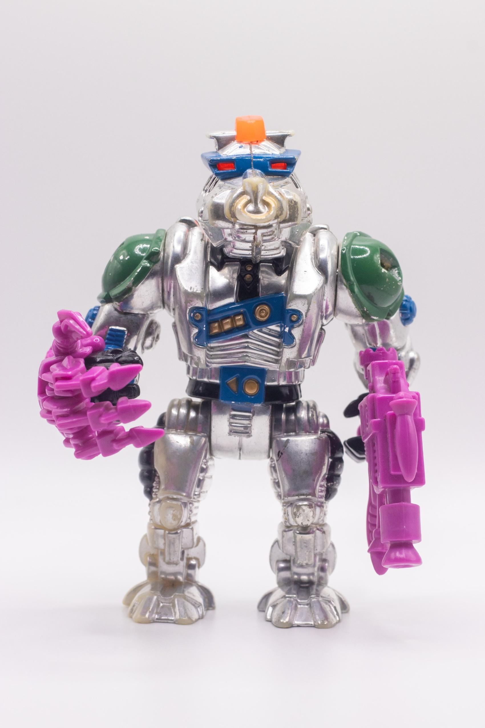 Face-on shot of Robotic Bebop action figure with Mechanical Mutant Claw and Lazer Luger–Flamethrower combo
