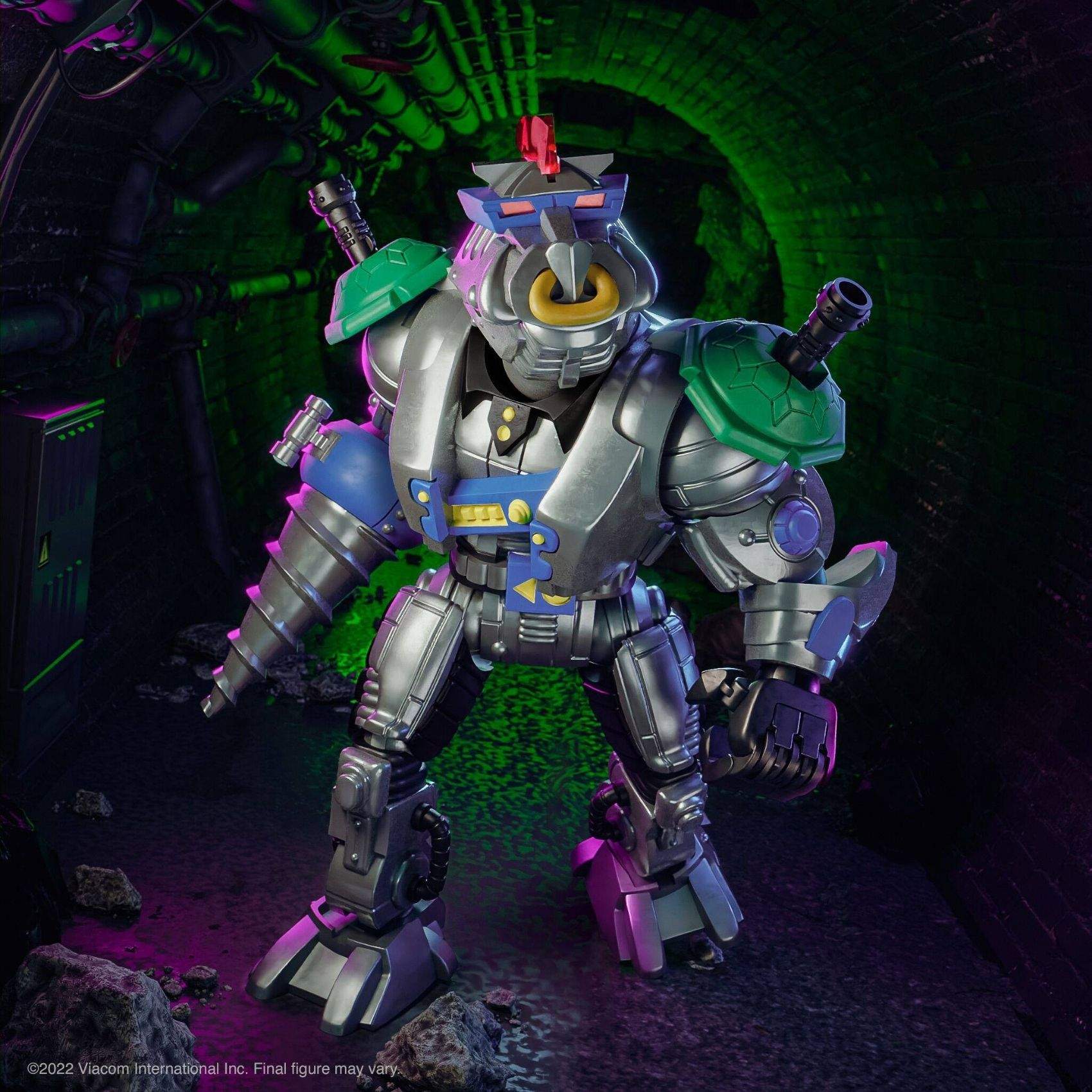 Front angle shot of Robotic Bebop action figure in a dimly lit sewer diorama with chrome finish, drill arm, and turtle shell shoulder pads