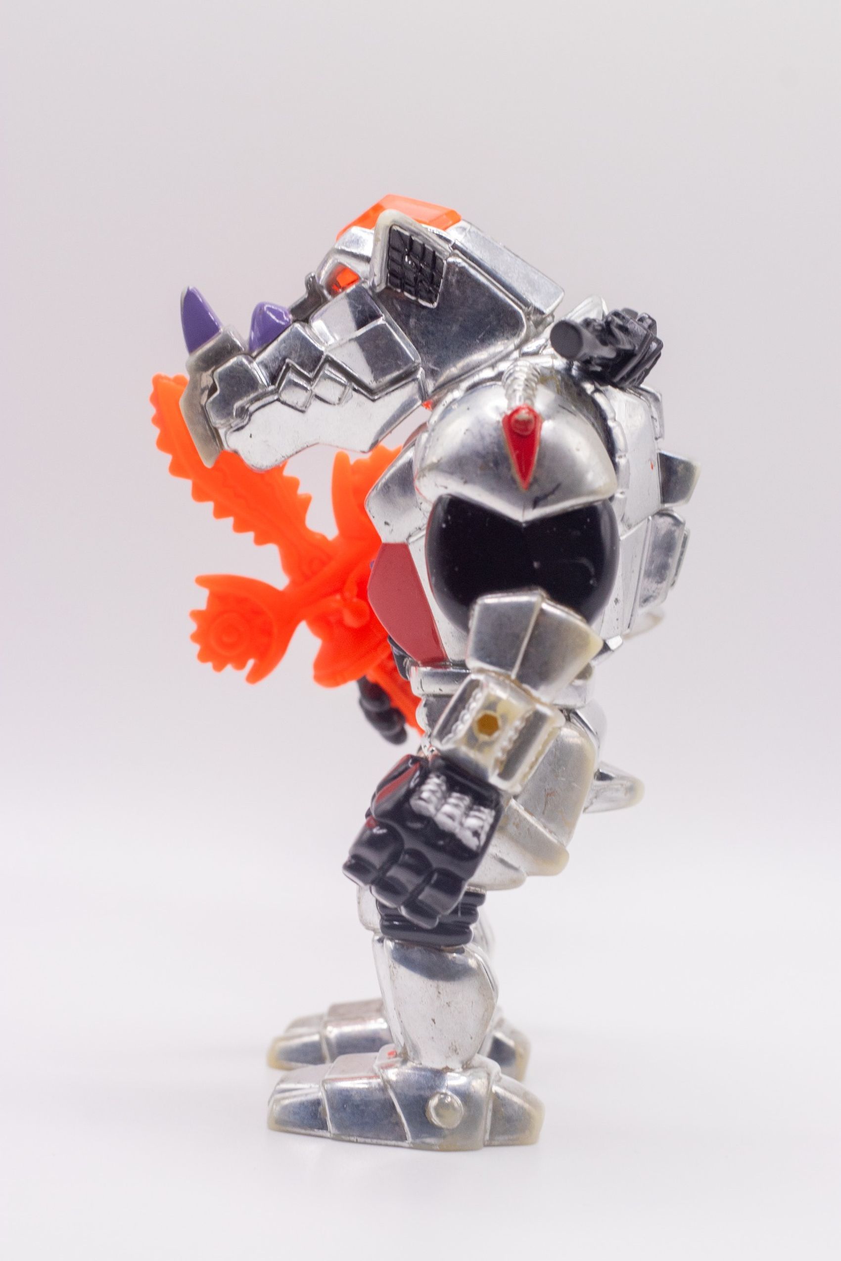 Left side shot of Robotic Rocksteady action figure with Chilling Chainsaw Sword