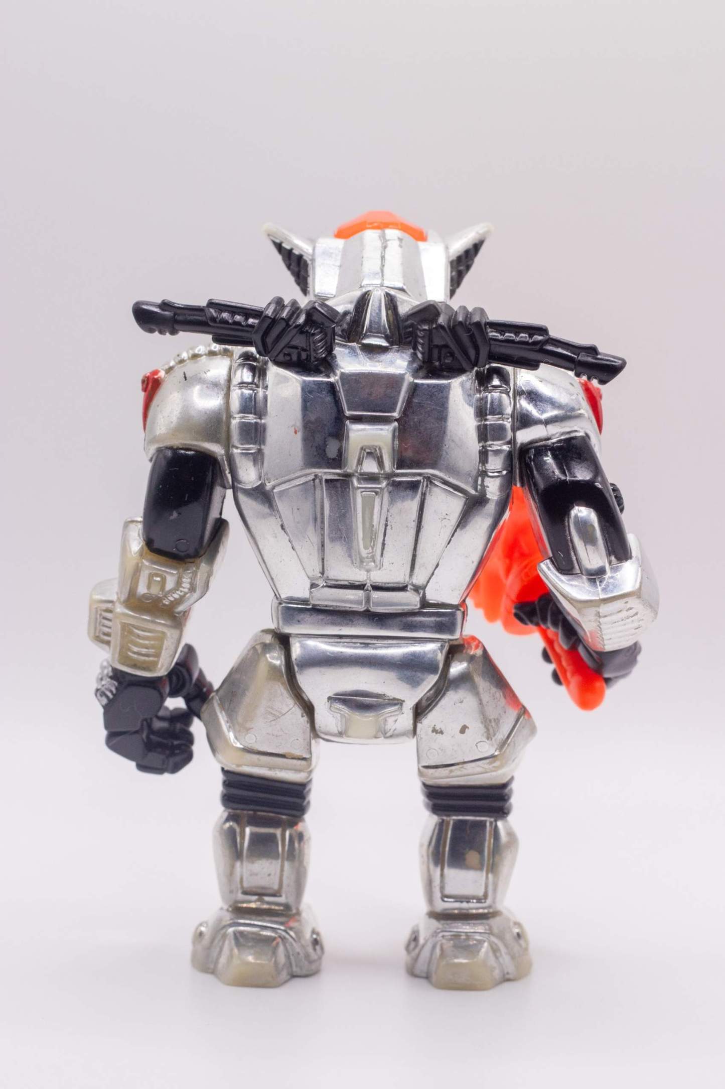 Back view of Robotic Rocksteady action figure showing chrome back and handlebars