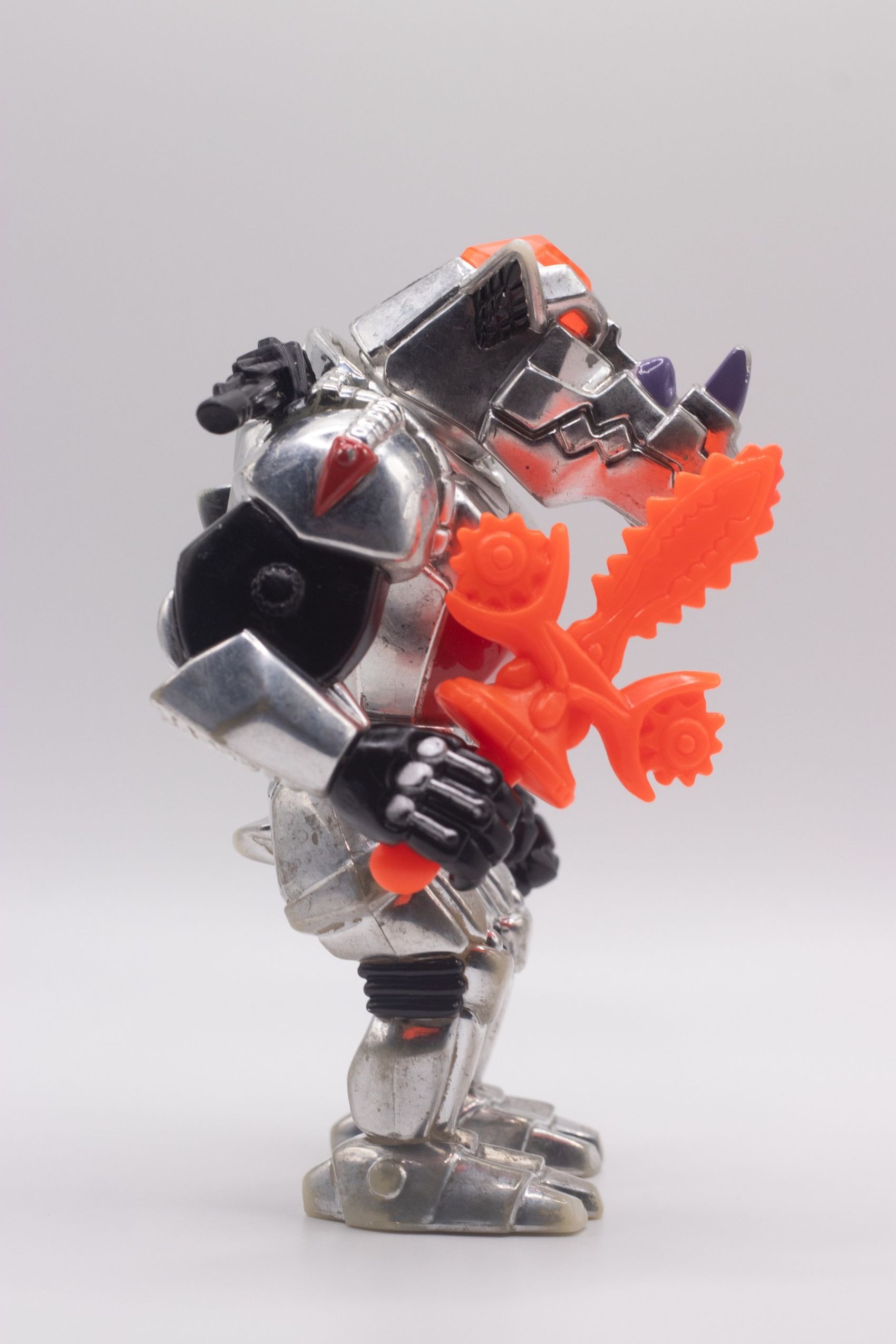 Right side shot of Robotic Rocksteady action figure with Chilling Chainsaw Sword