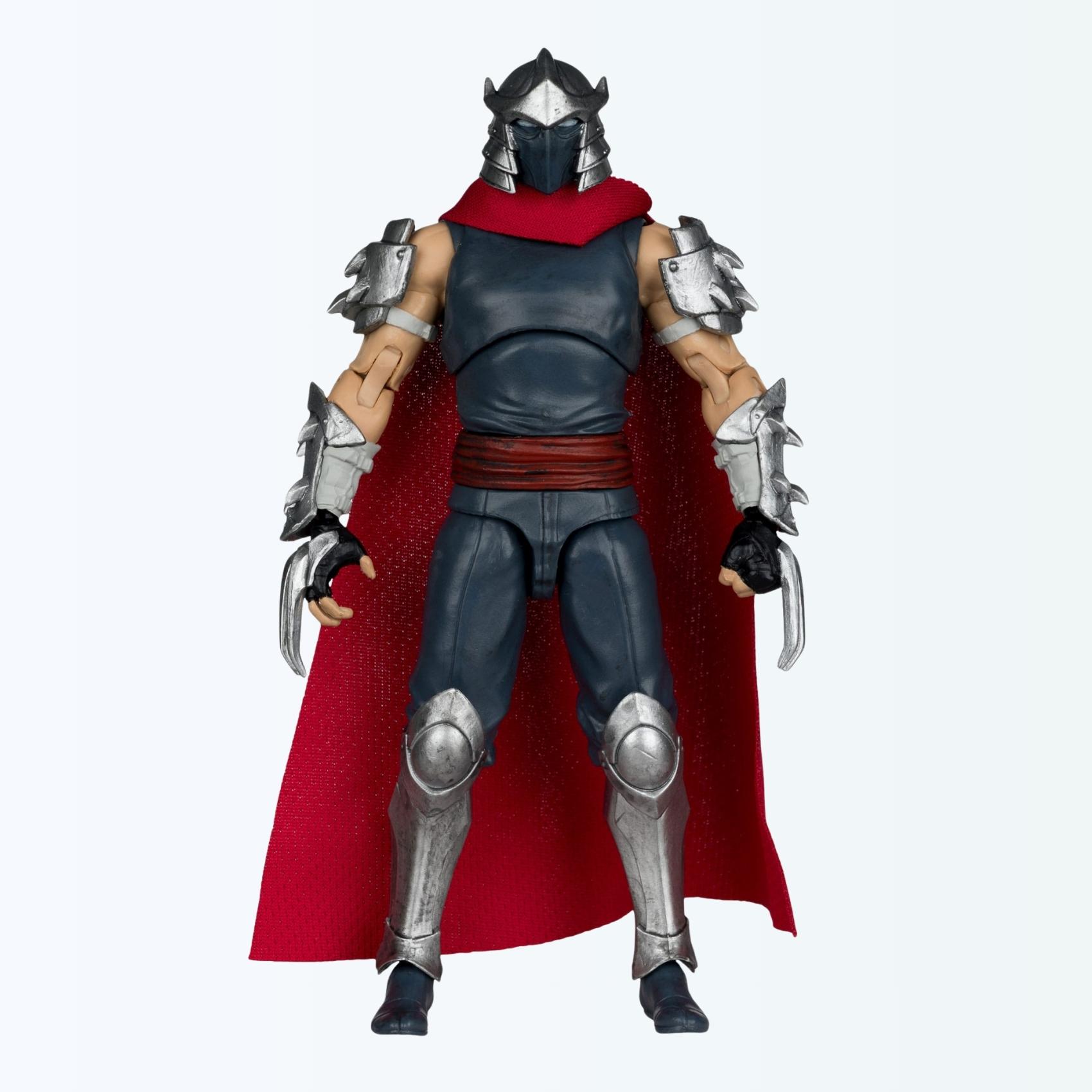 Front shot of Shredder action figure standing with red fabric cape and steel claws