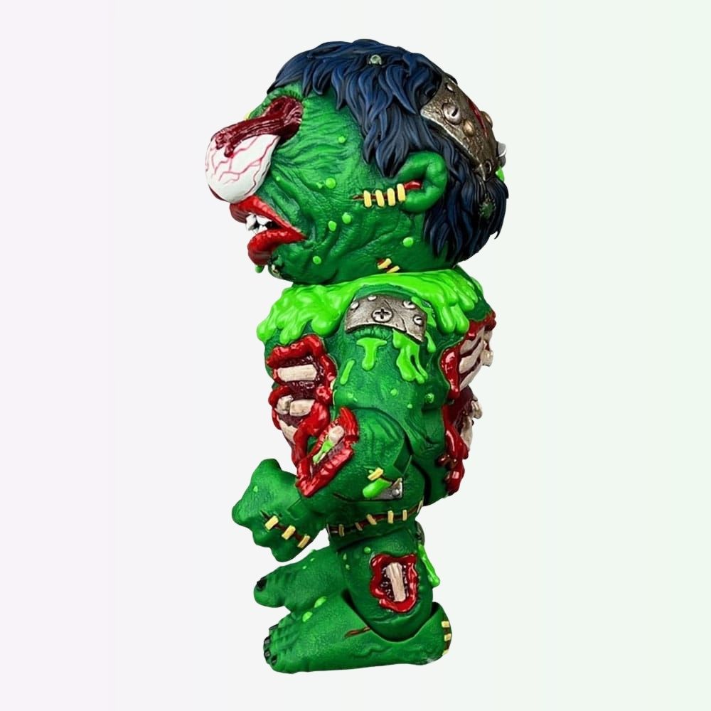 Left side view of Slobulus Madballs Premium DNA action figure showing dangling eyeball and open wounds