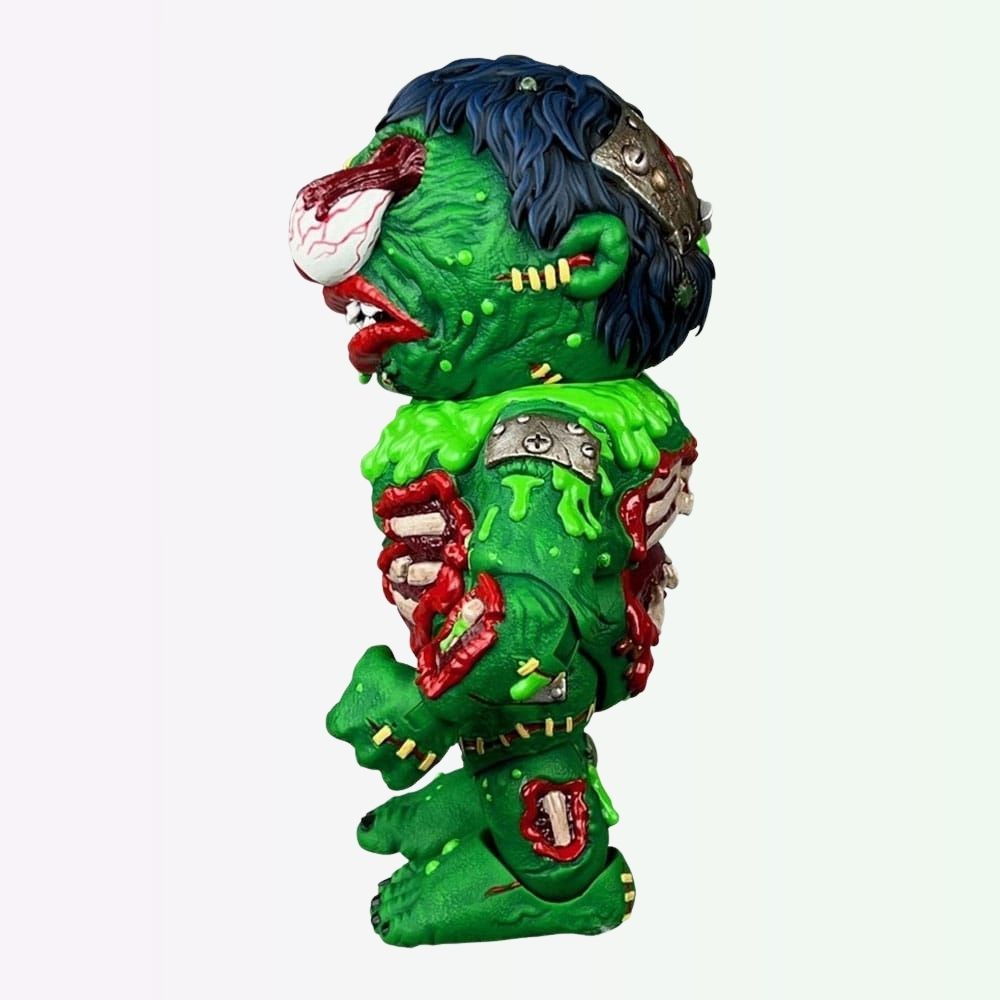 Left side view of Slobulus Madballs Premium DNA action figure showing dangling eyeball and open wounds