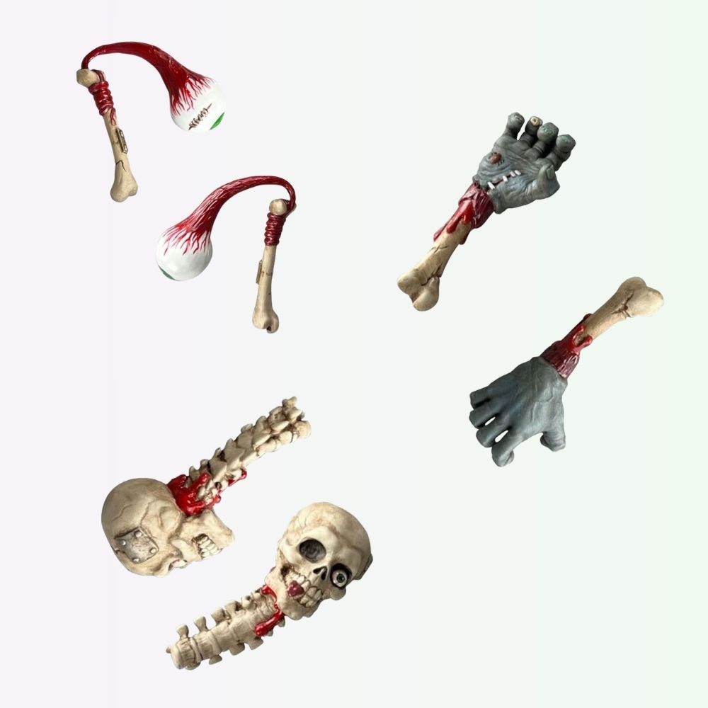 Accessory set for Slobulus Madballs Premium DNA action figure including eyeball club, severed arm, and skull with spine