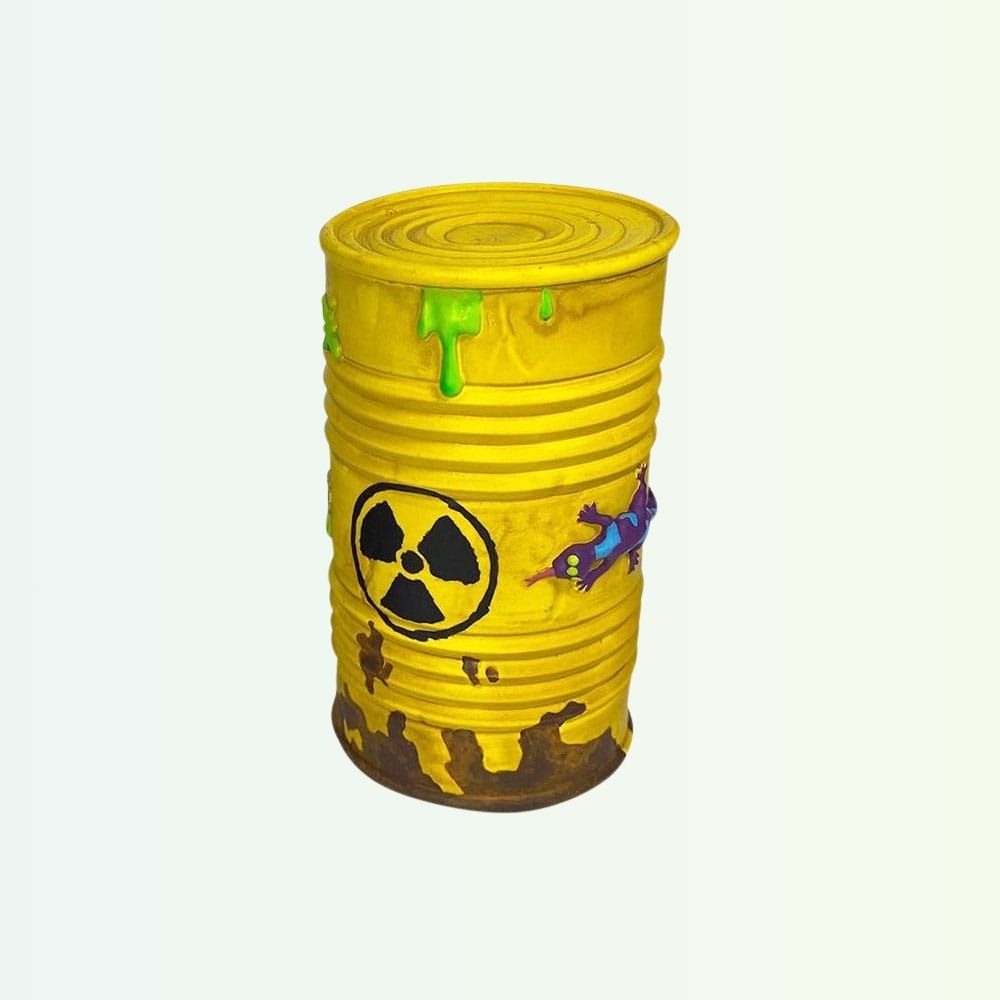 Toxic waste barrel accessory with radioactive symbol and green ooze detail
