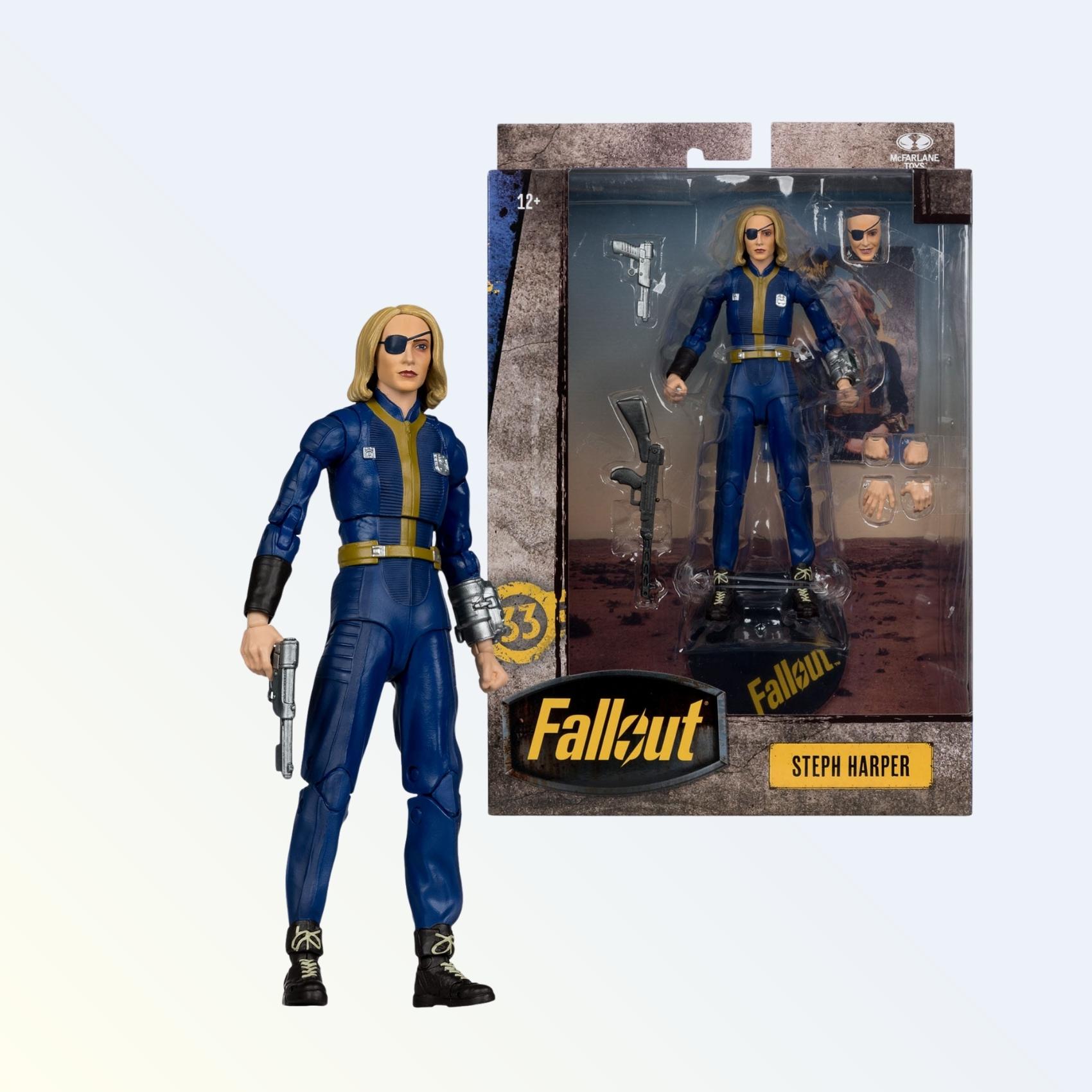 Front pose shot of Steph Harper action figure with eyepatch and Vault 33 jumpsuit in front of packaging