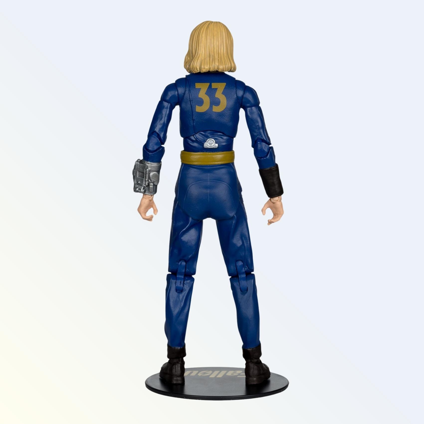 Rear view shot of Steph Harper action figure showing Vault 33 logo on jumpsuit
