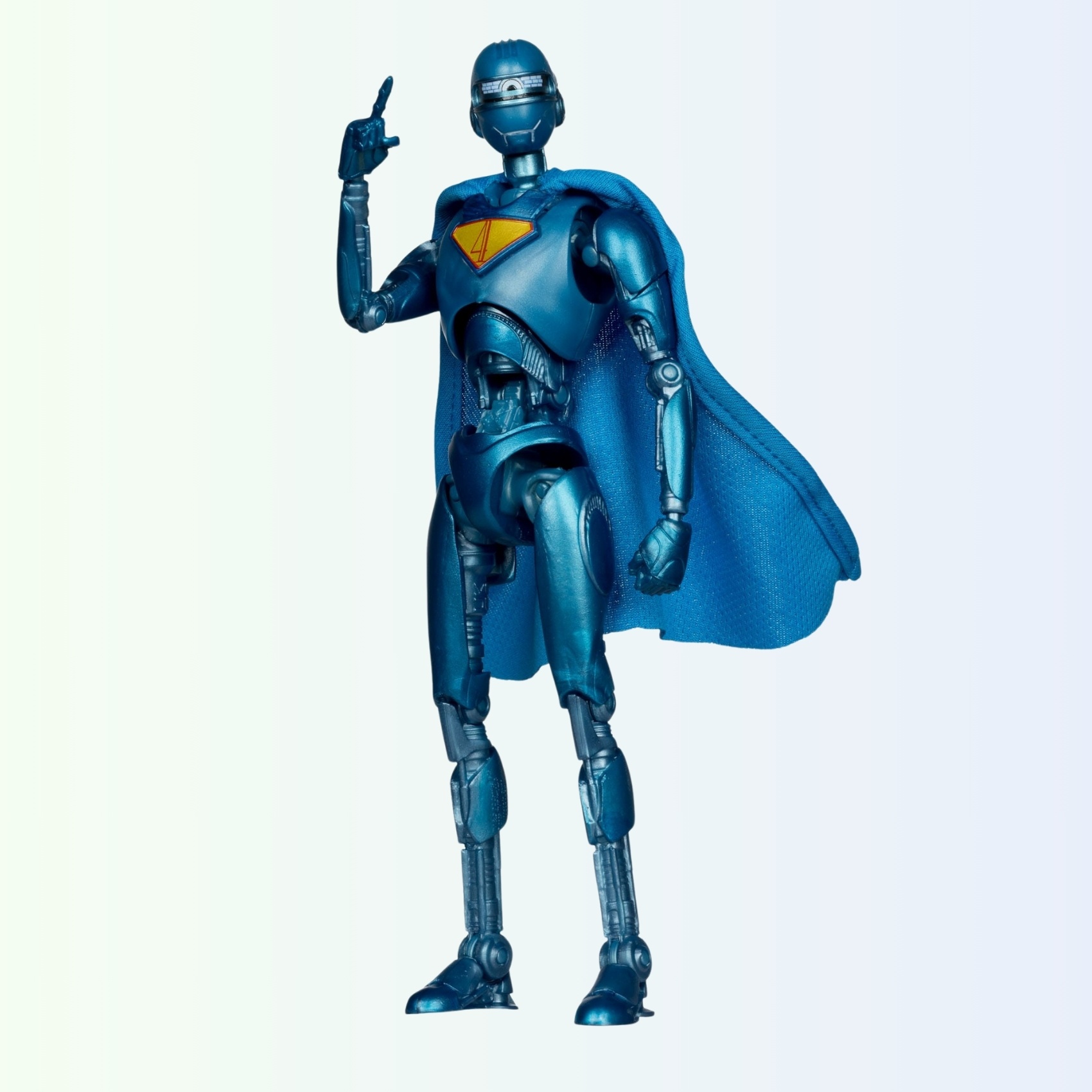 Angled pose of Superman Robot action figure, with cape flowing behind and finger raised